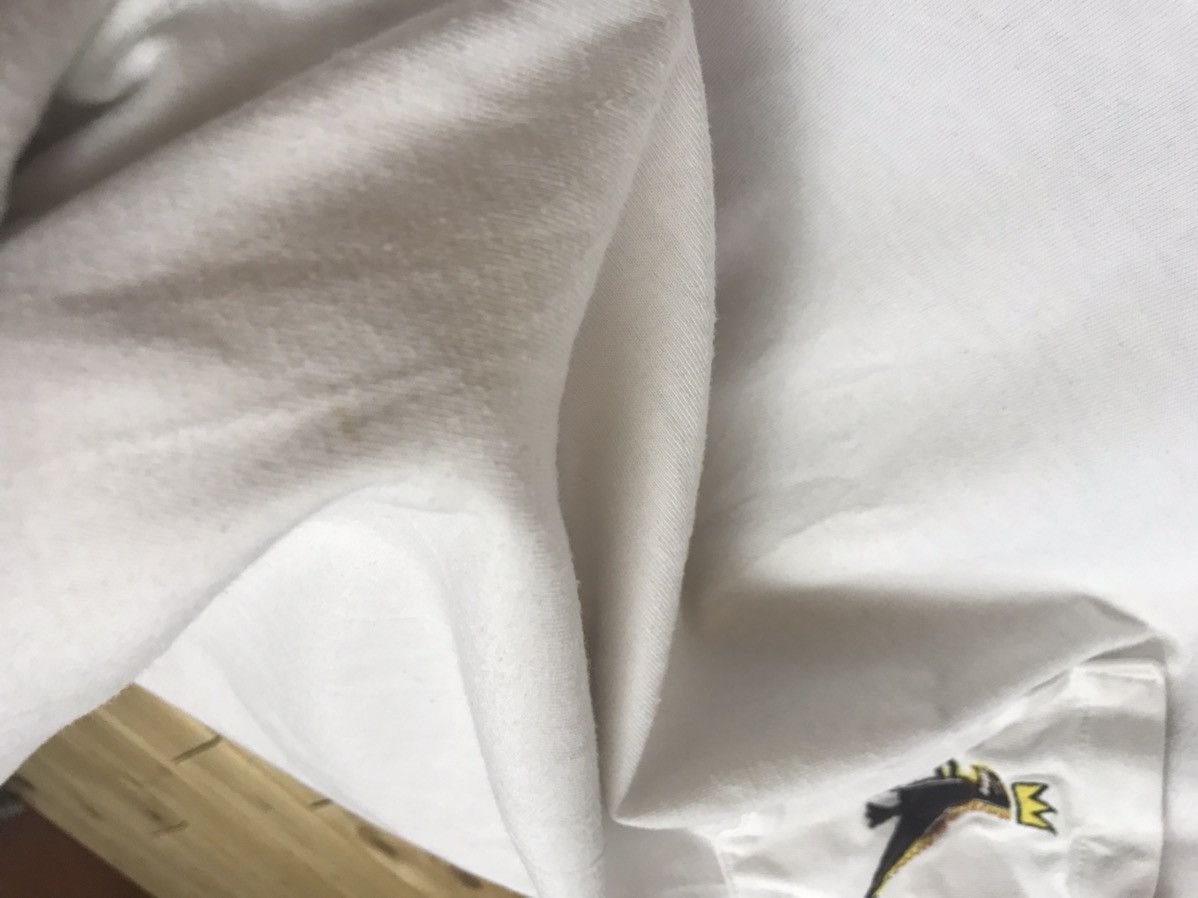 Uniqlo Uniqlo X Jean Michael king T Rex pocket t-shirt Size US XL / EU 56 / 4 - 9 Thumbnail