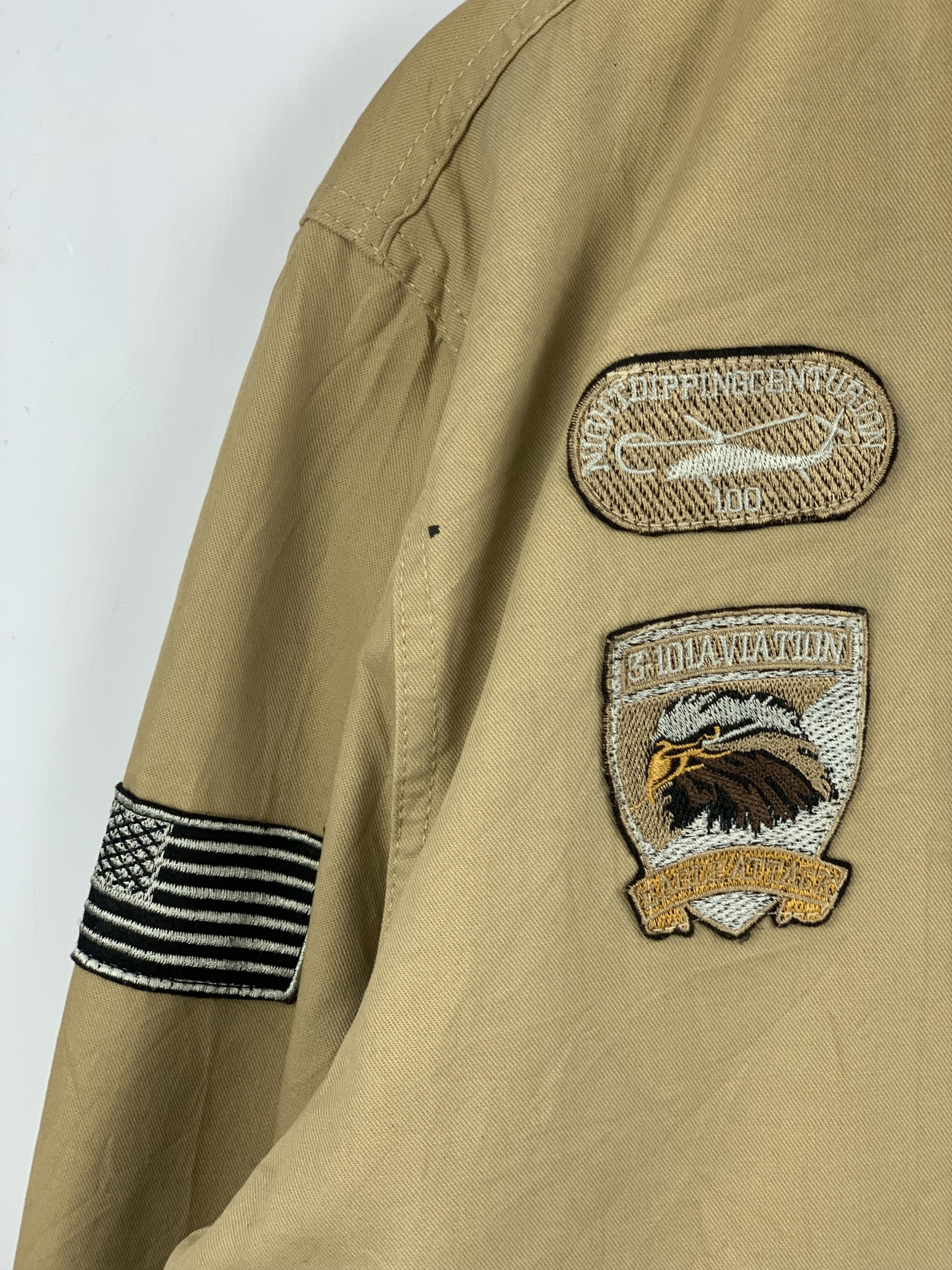 Japanese Brand Vintage LLSBG Military Patch Bomber Jacket– Tan, Size 4XL Size US XXL / EU 58 / 5 - 11 Thumbnail