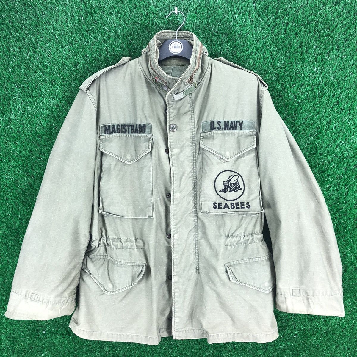 image of Military x US Issue vintage 70's Us Navy Seabees M65 Field Jacket in Olive Green (Size Medium)