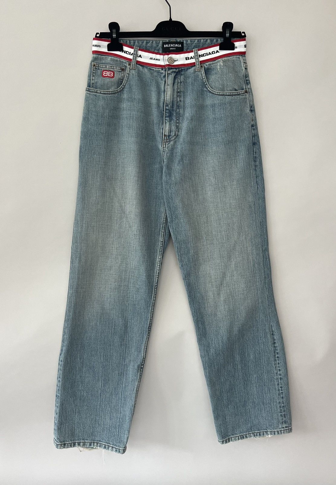 image of $1.4K ValueBalenciaga Logo Waistband Distressed Jeans in Blue, Men's (Size 32)