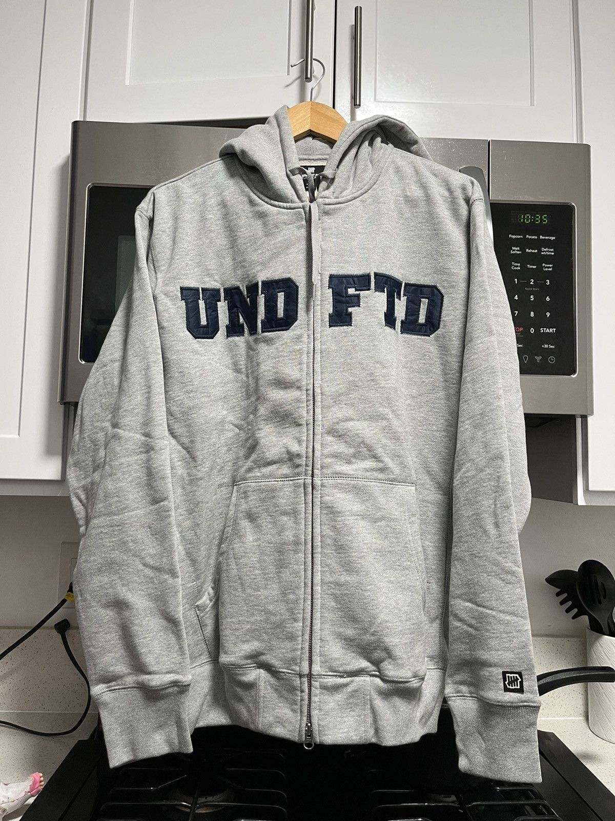 Undefeated grey hoodie sales
