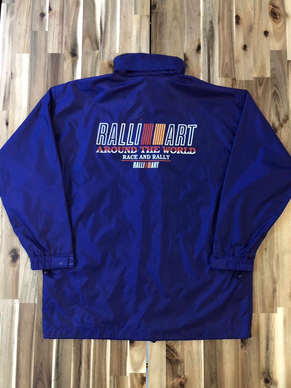 image of Racing x Sports Specialties Ralli Art Around The World Race And Rally Jacket in Blue (Size Large)