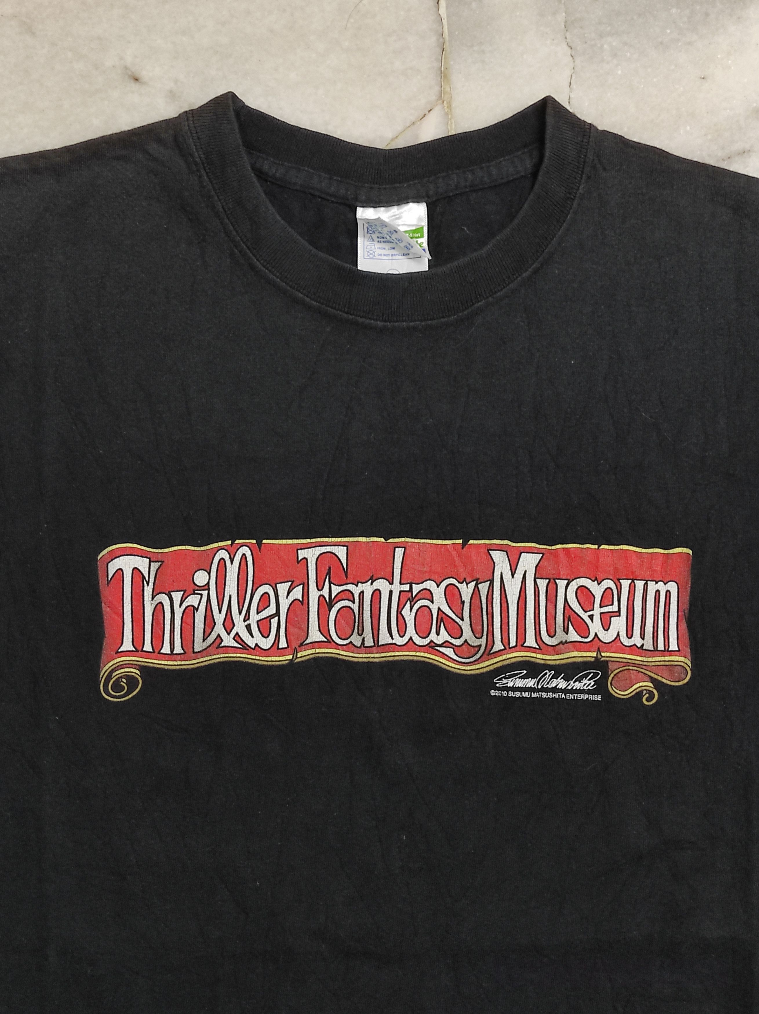Japanese Brand 2010 Thriller Fantasy Museum Susumu Matsushita Ent Staff tee Size US L / EU 52-54 / 3 - 7 Thumbnail