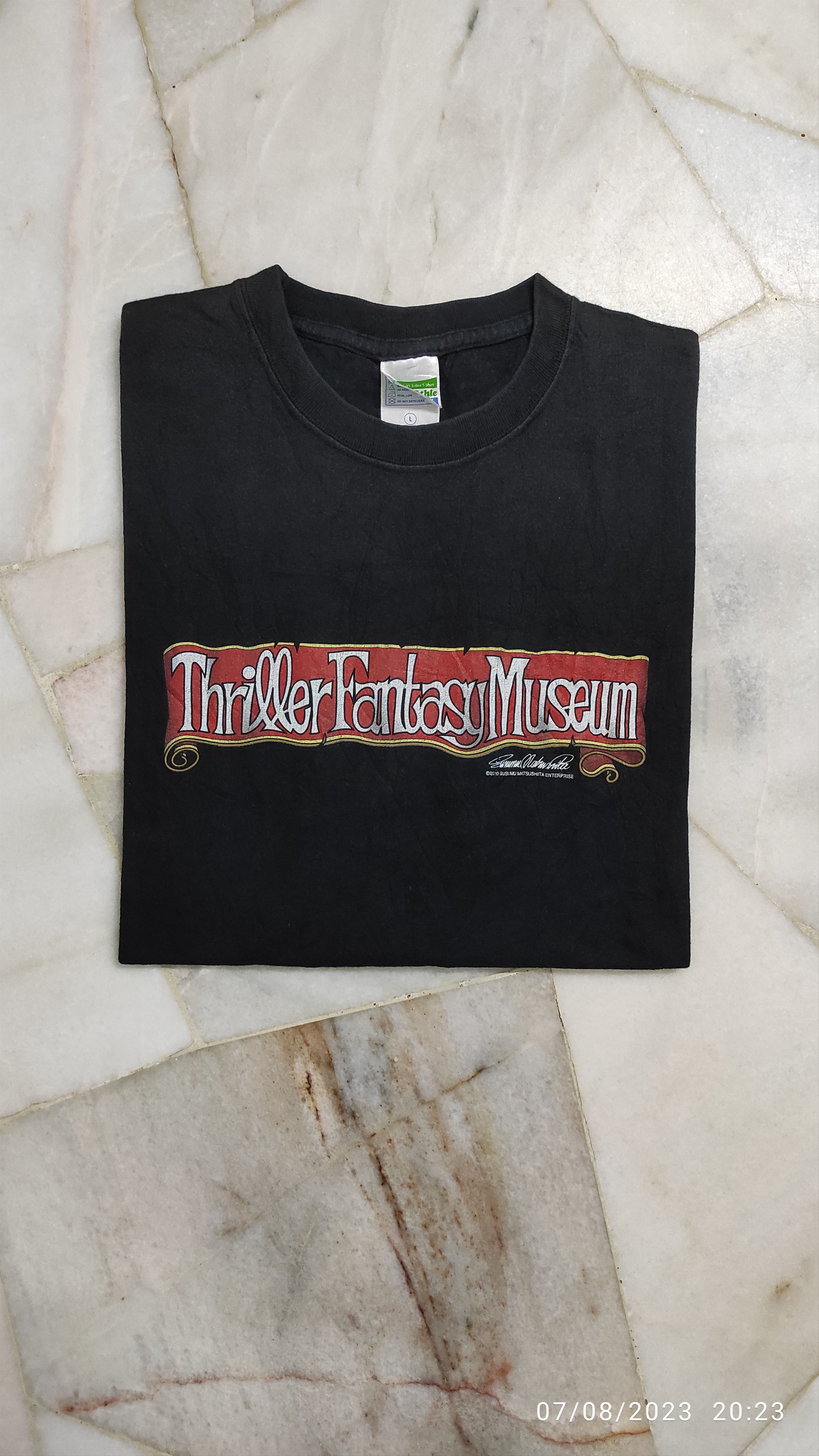 Japanese Brand 2010 Thriller Fantasy Museum Susumu Matsushita Ent Staff tee Size US L / EU 52-54 / 3 - 11 Thumbnail