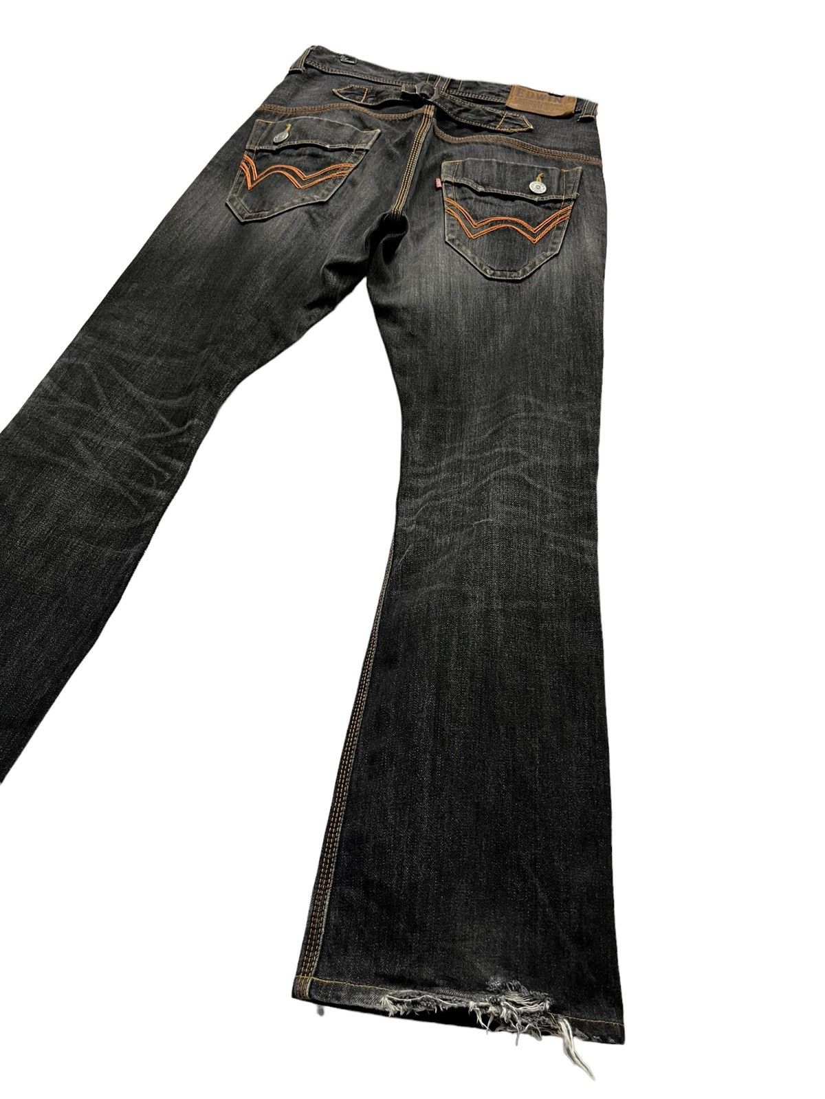 image of Distressed Denim x Exclusive Denim Exclusive Vintage Distressed Buckle Back Flare Denim Jeans in Bl