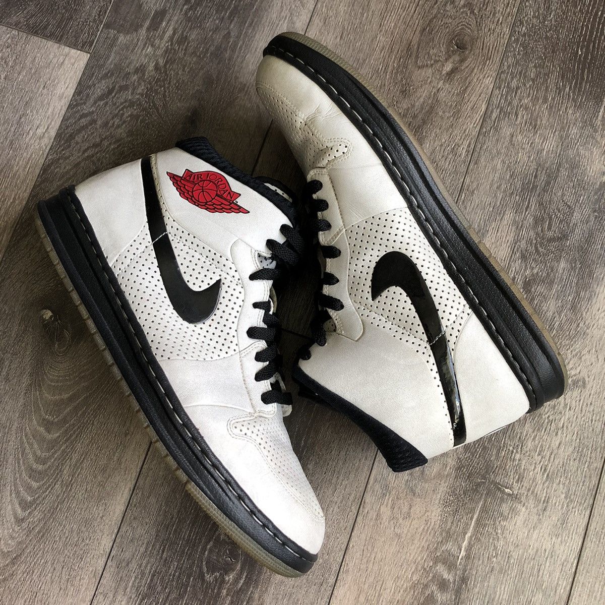 image of Jordan Nike Vintage 2000S Nike Air Jordan 1 Alpha Perforated High Shoes in White/Black (Size 12)