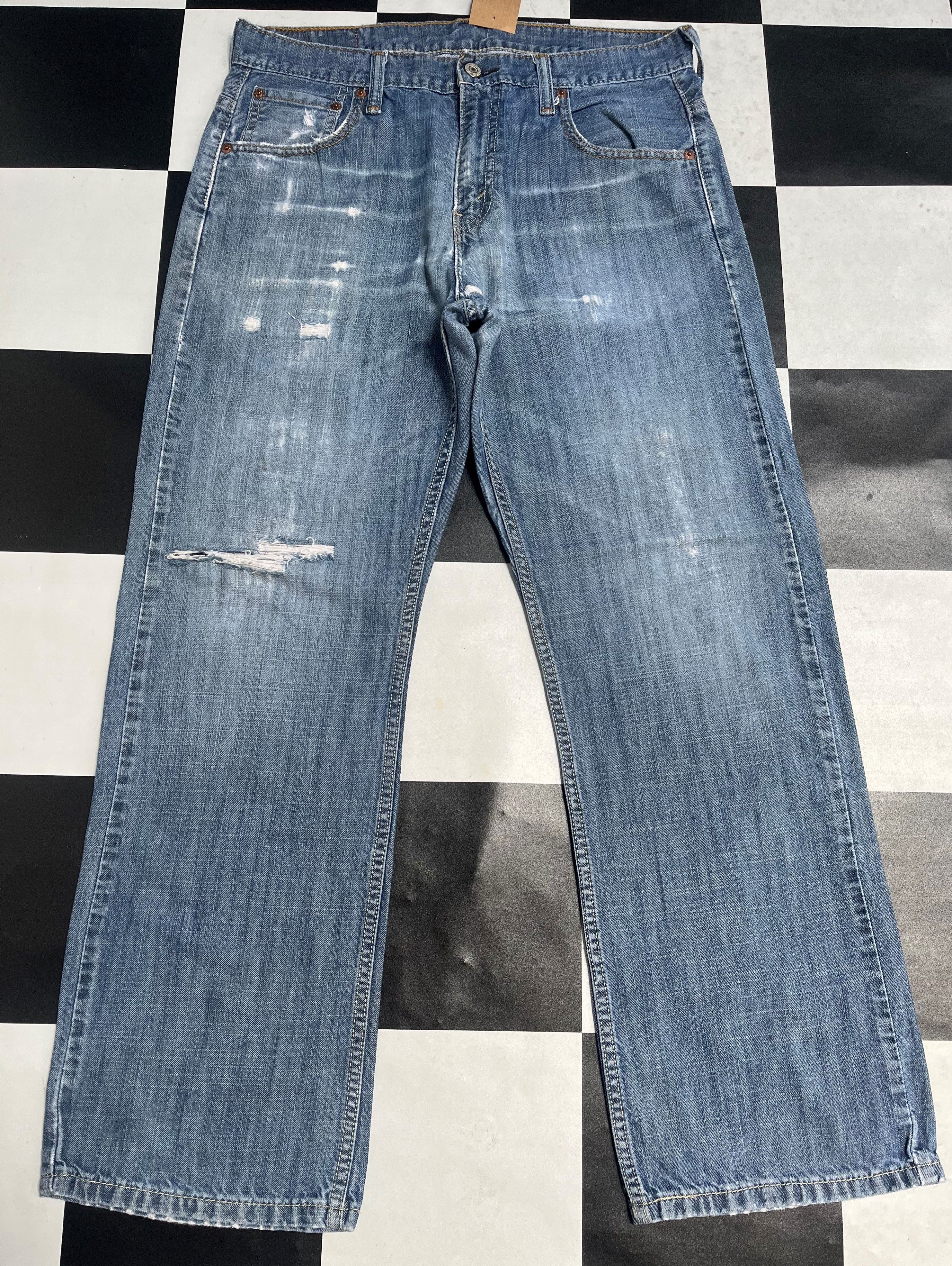 image of Vintage Levis 569 Distressed Denim Jean L19 in Blue, Men's (Size 33)
