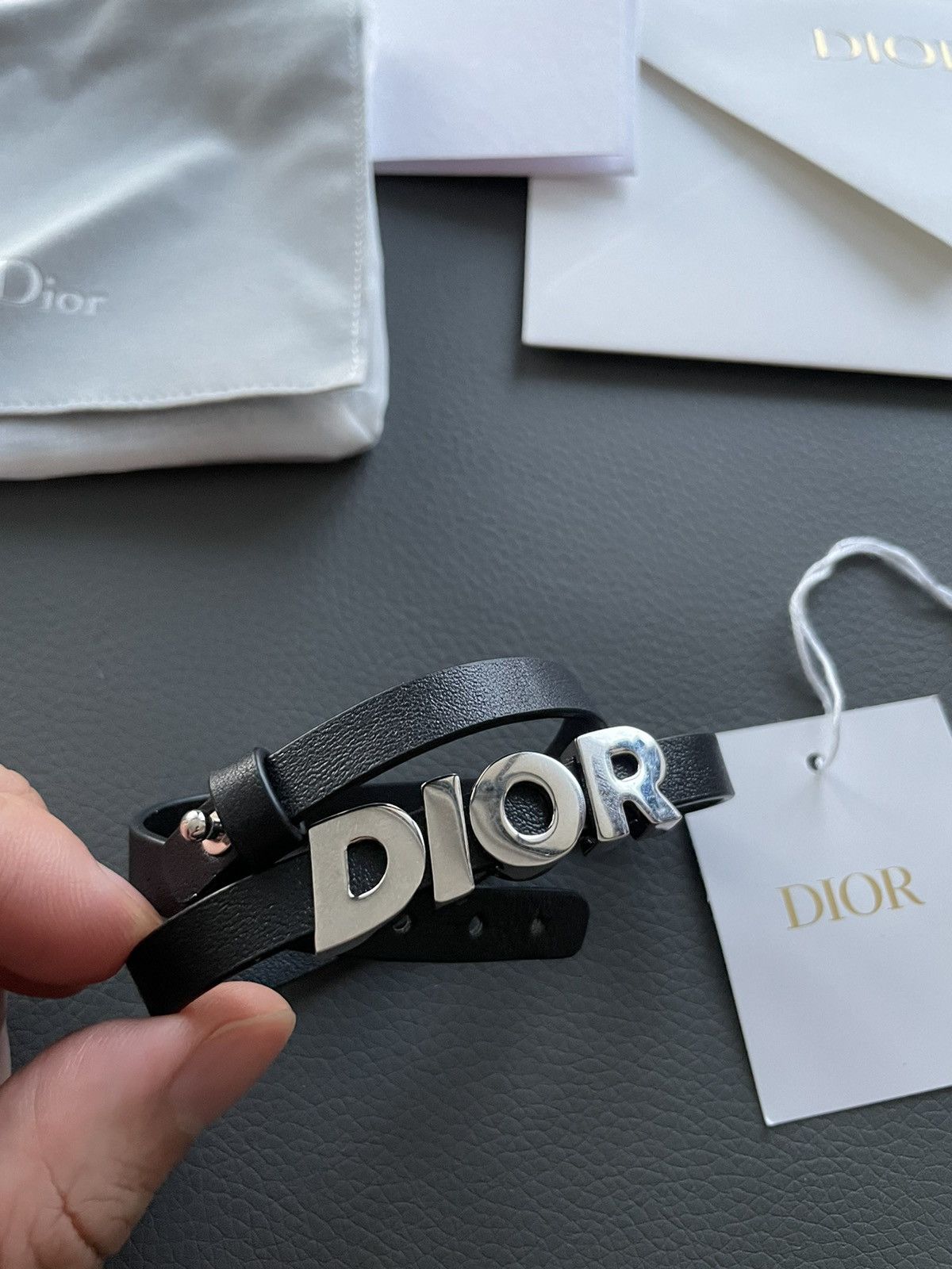 image of Dior Super Runway Limited Edition Silver Logo Leather Bracelet in Black, Men's