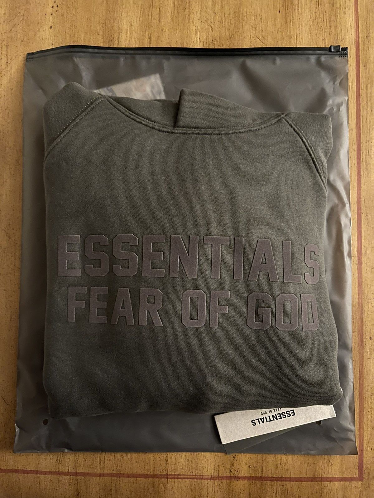 Fear of god essentials cheapest hoodie off black size XL