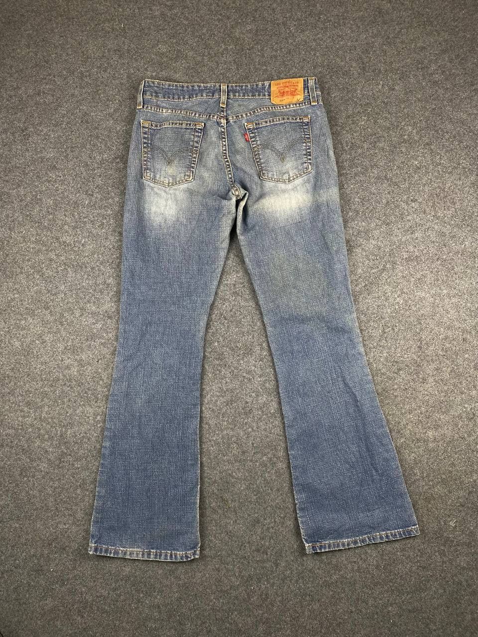 image of Levis 518 Superlow Stretch Bootcut Flare Denim in Light Blue, Women's (Size 32)
