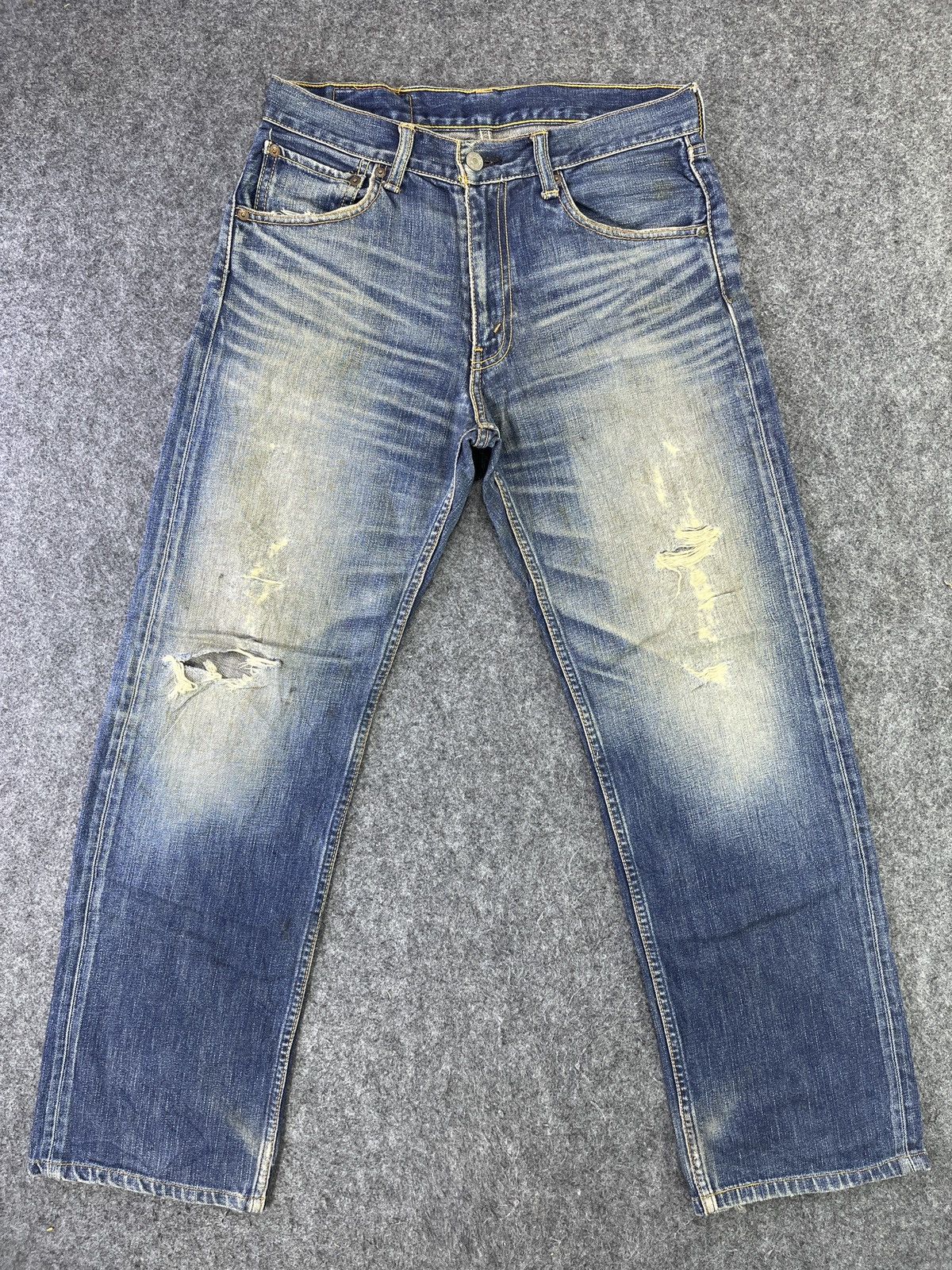 image of 90’S Vintage Levis 703 Distressed Jeans - J847 in Blue, Men's (Size 31)
