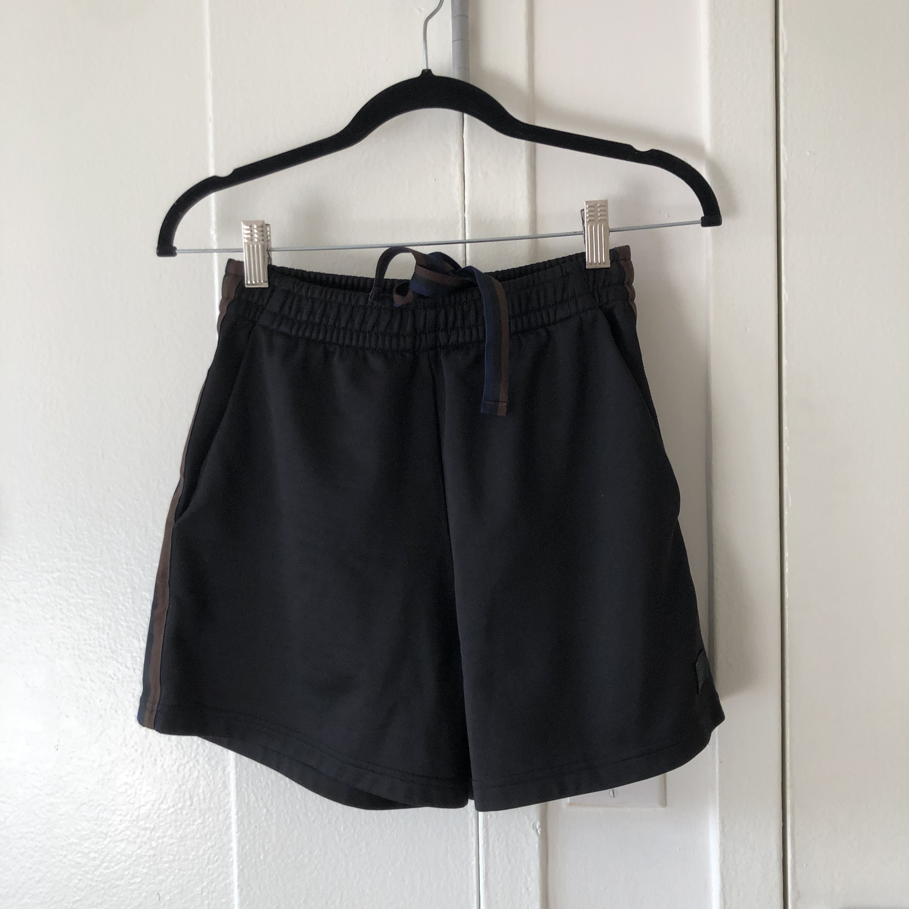 image of Acne Studios Navarro Face Logo Shorts in Black, Men's (Size 28)
