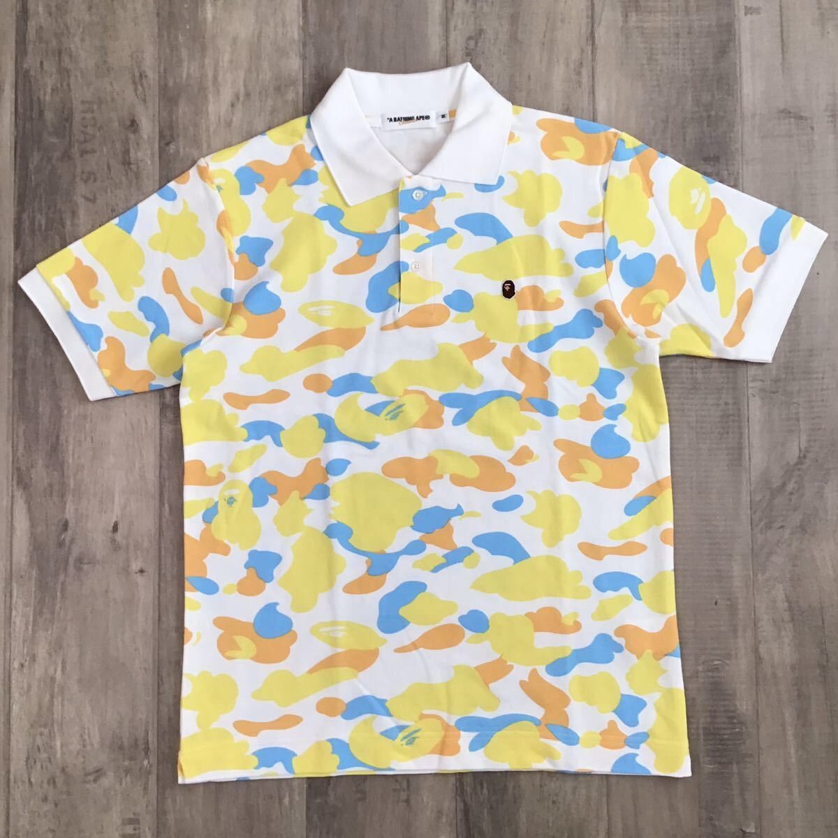 image of Sapporo Limited Color Camo Bape Polo Shirt A Bathing Ape in Yellow, Men's (Size Medium)