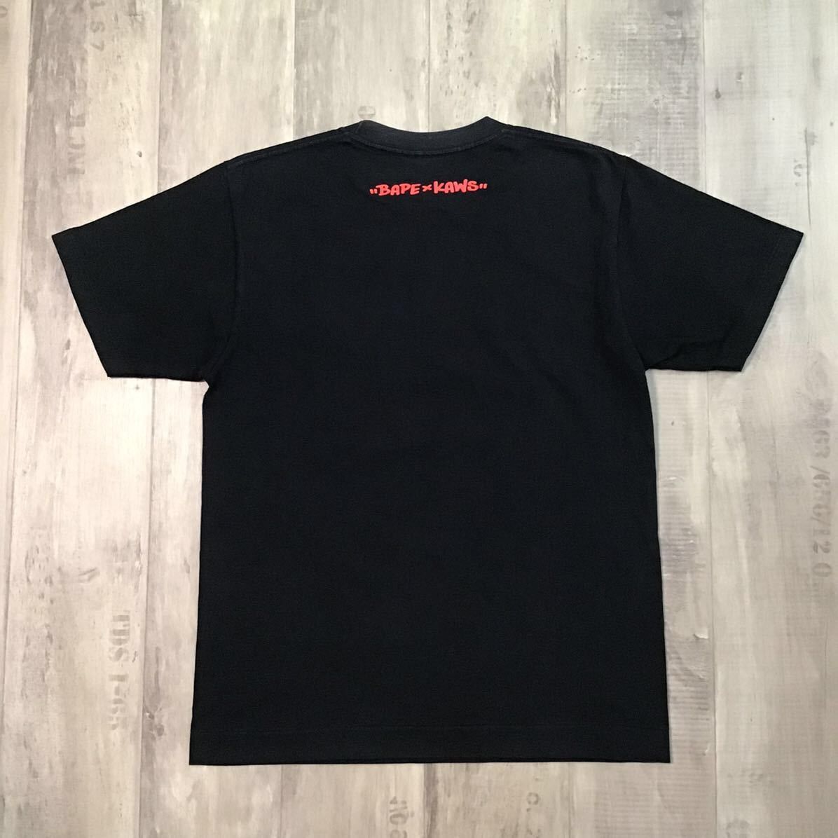 Bape × Kaws × Nigo BAPE × KAWS skullsta Big Face T-shirt black a bathing ape Size US M / EU 48-50 / 2 - 3 Thumbnail