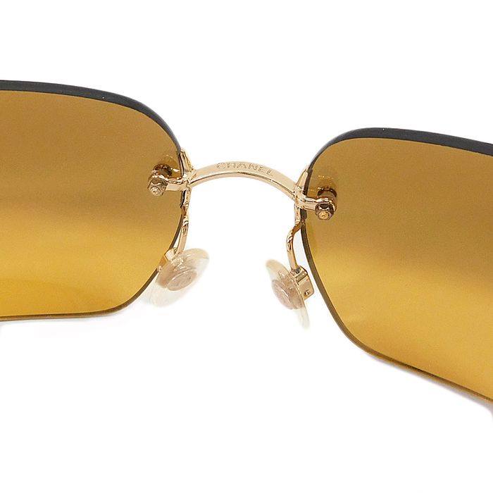 Womens Rhinestone Edge Jewel Rimless Cat Eye Sunglasses Silver