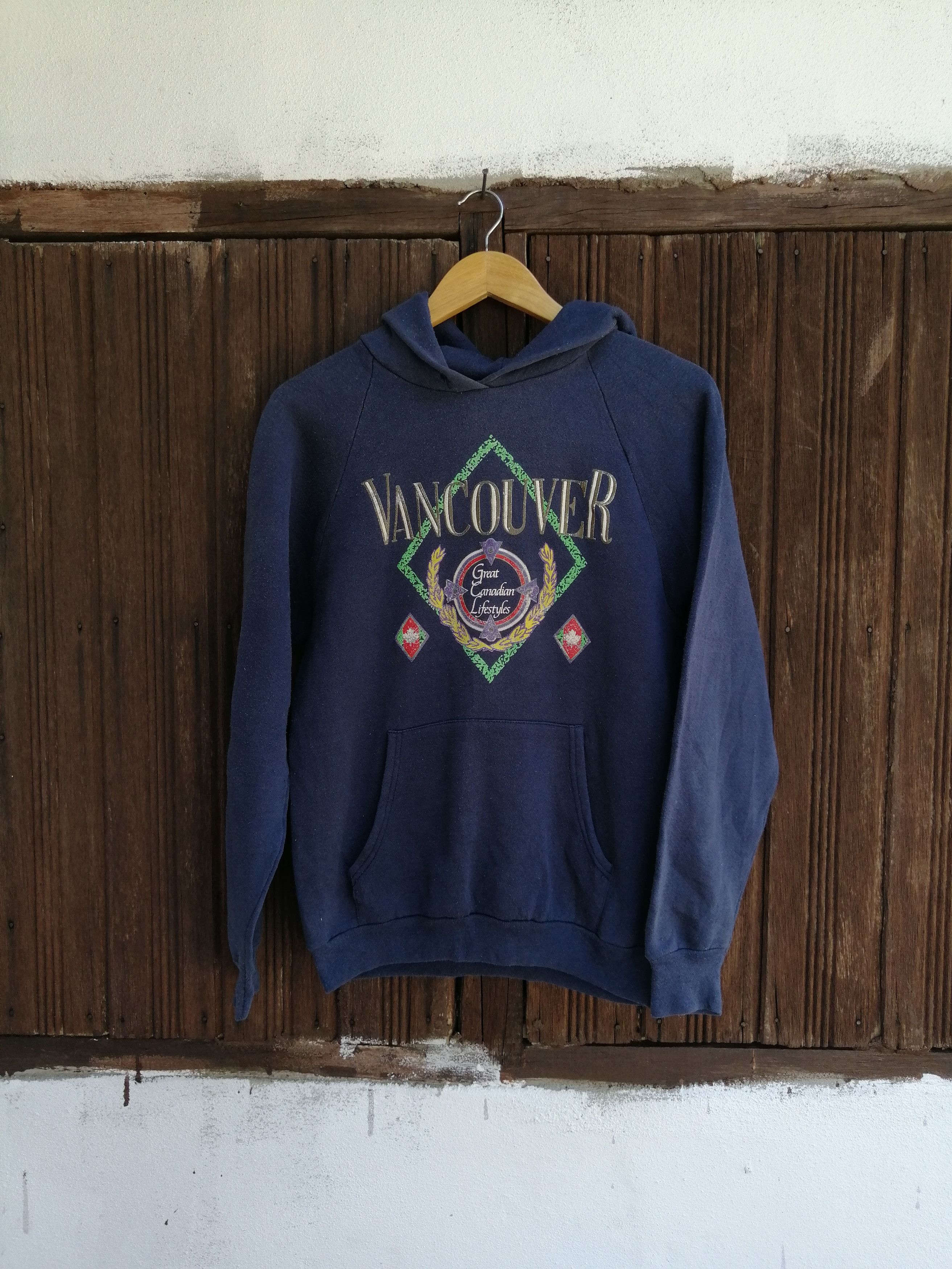 image of Vintage 90's Vancouver Canada Pullover Hoodie in Blue, Men's (Size Medium)