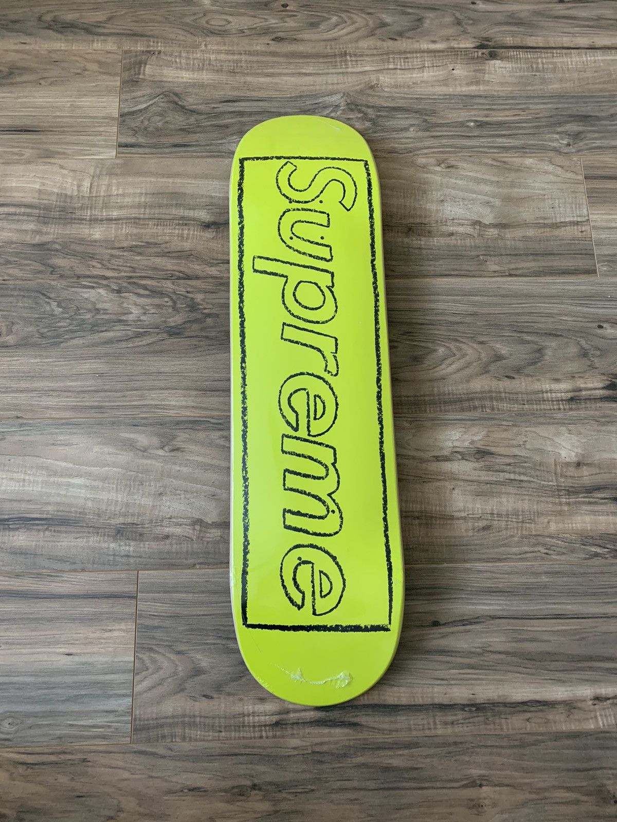 image of Kaws Chalk Logo Skateboard Deck in Yellow, Men's