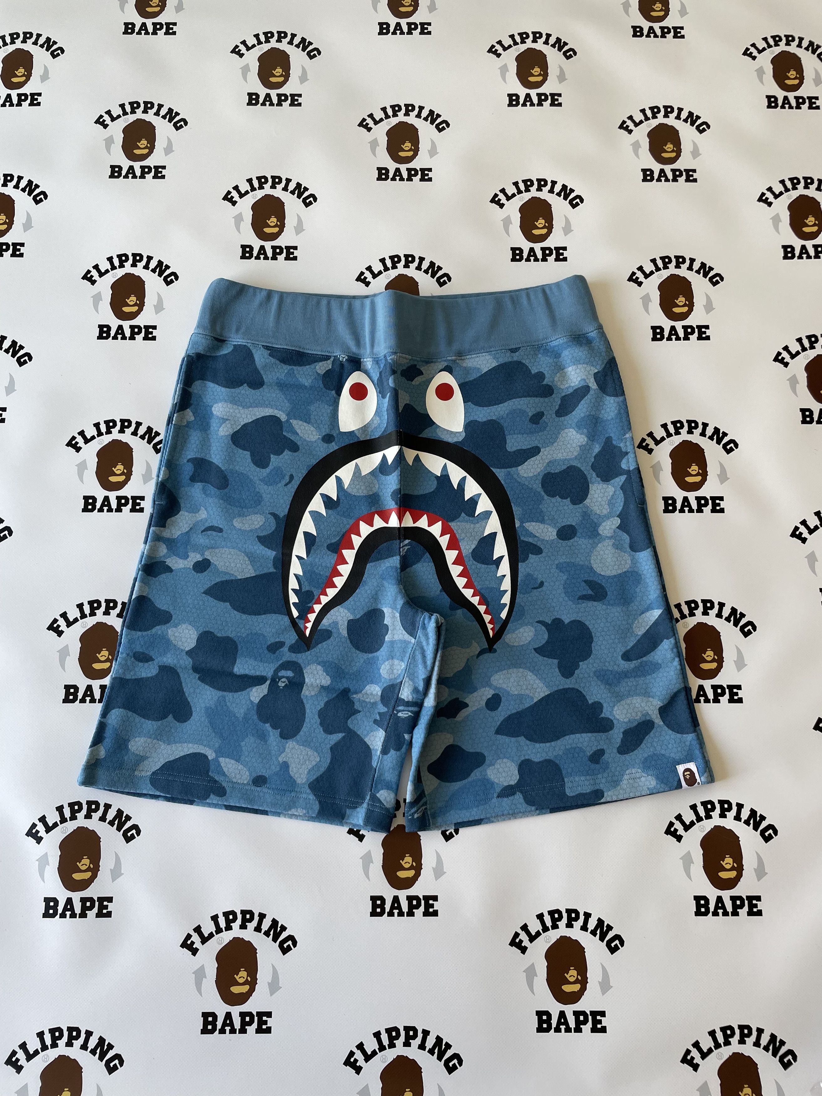 image of Bape Honeycomb Camo Shark Sweat Shorts in Blue, Men's (Size 32)