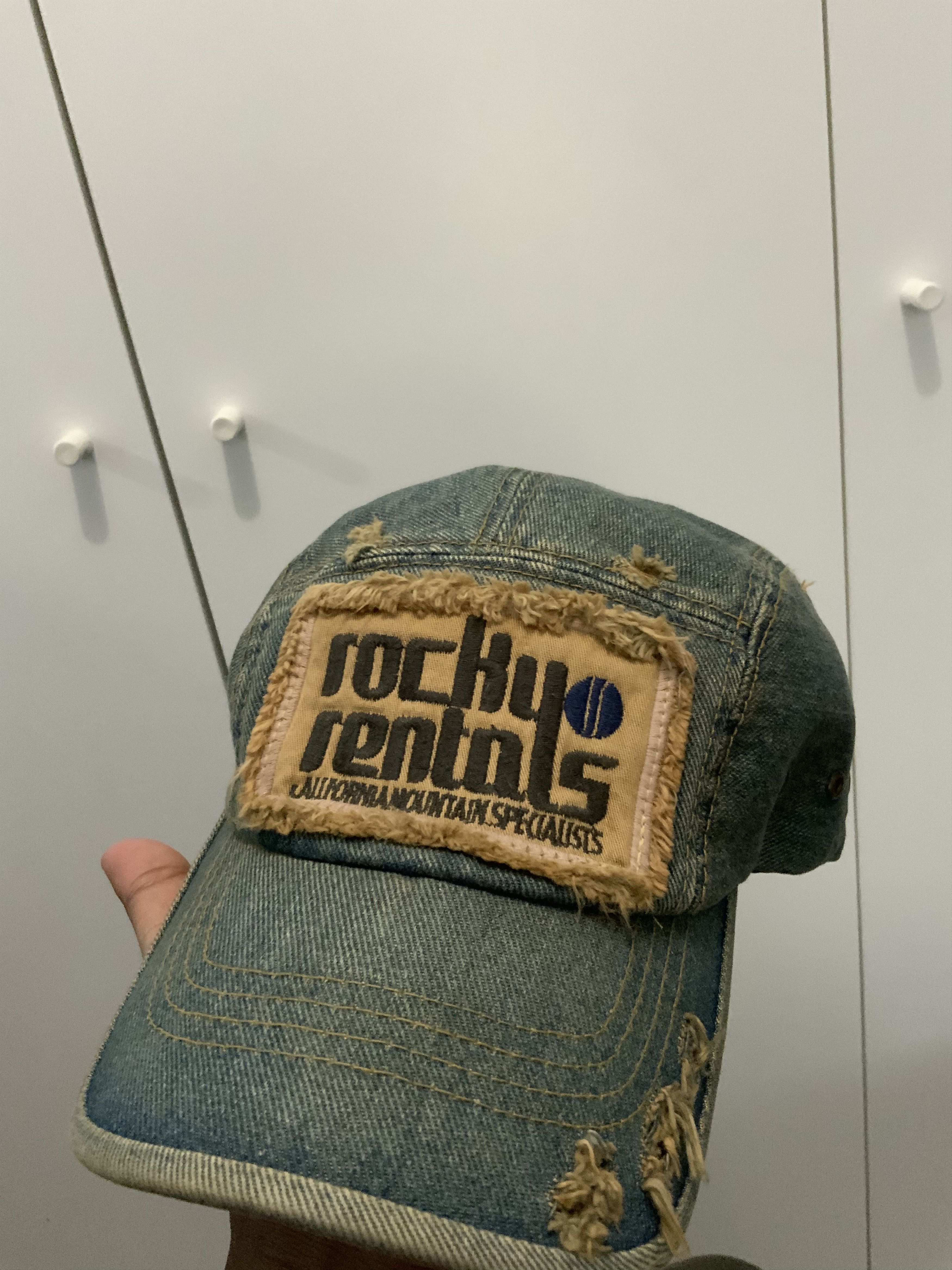 The Rocky Rentals Distressed Denim Hat