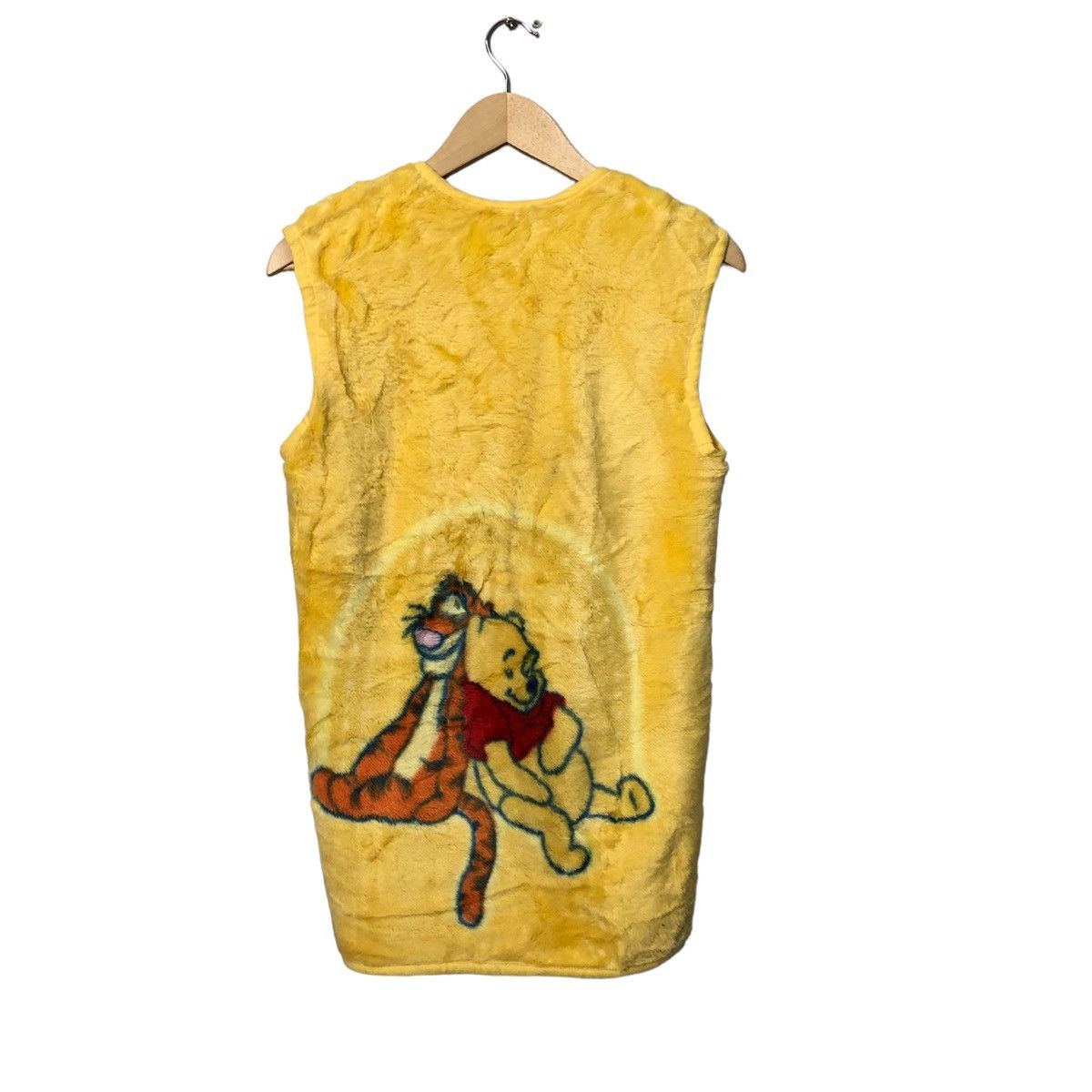 image of Cartoon Network x Disney Vintage Disney Winnie The Pooh Big Logo Sleeveless Vest in Yellow, Women's