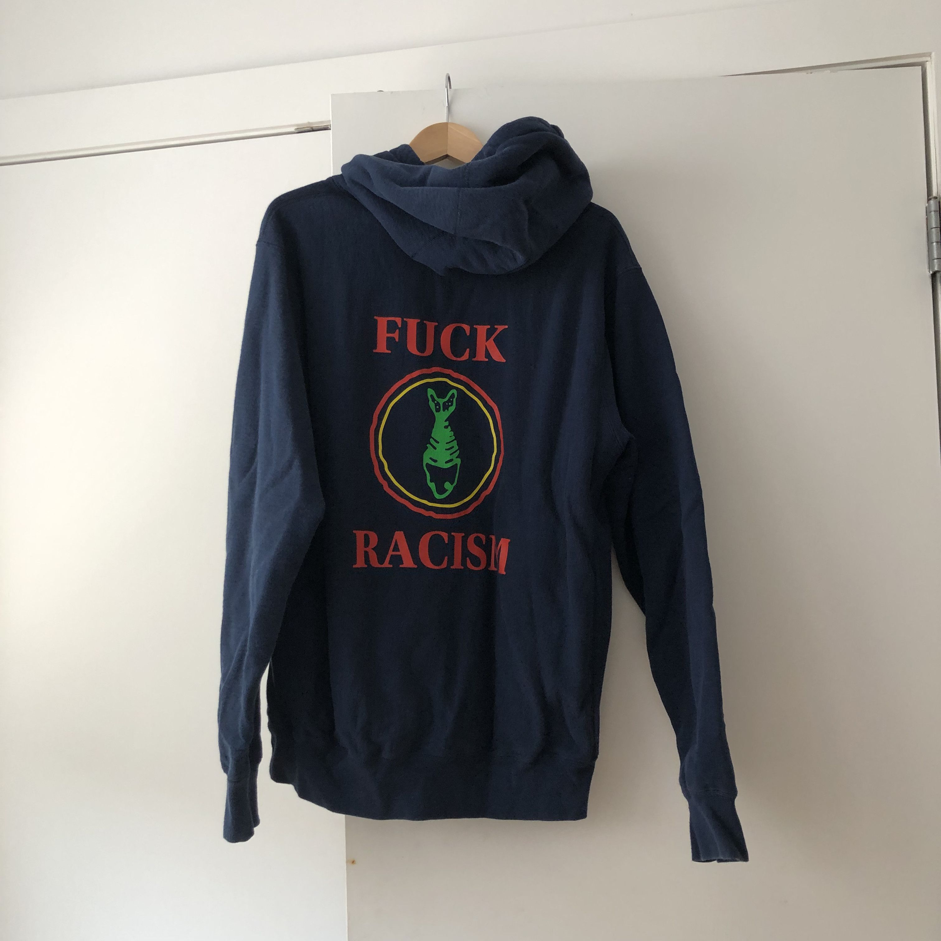 image of Noah Fuck Racism Hoodie in Navy, Men's (Size XL)