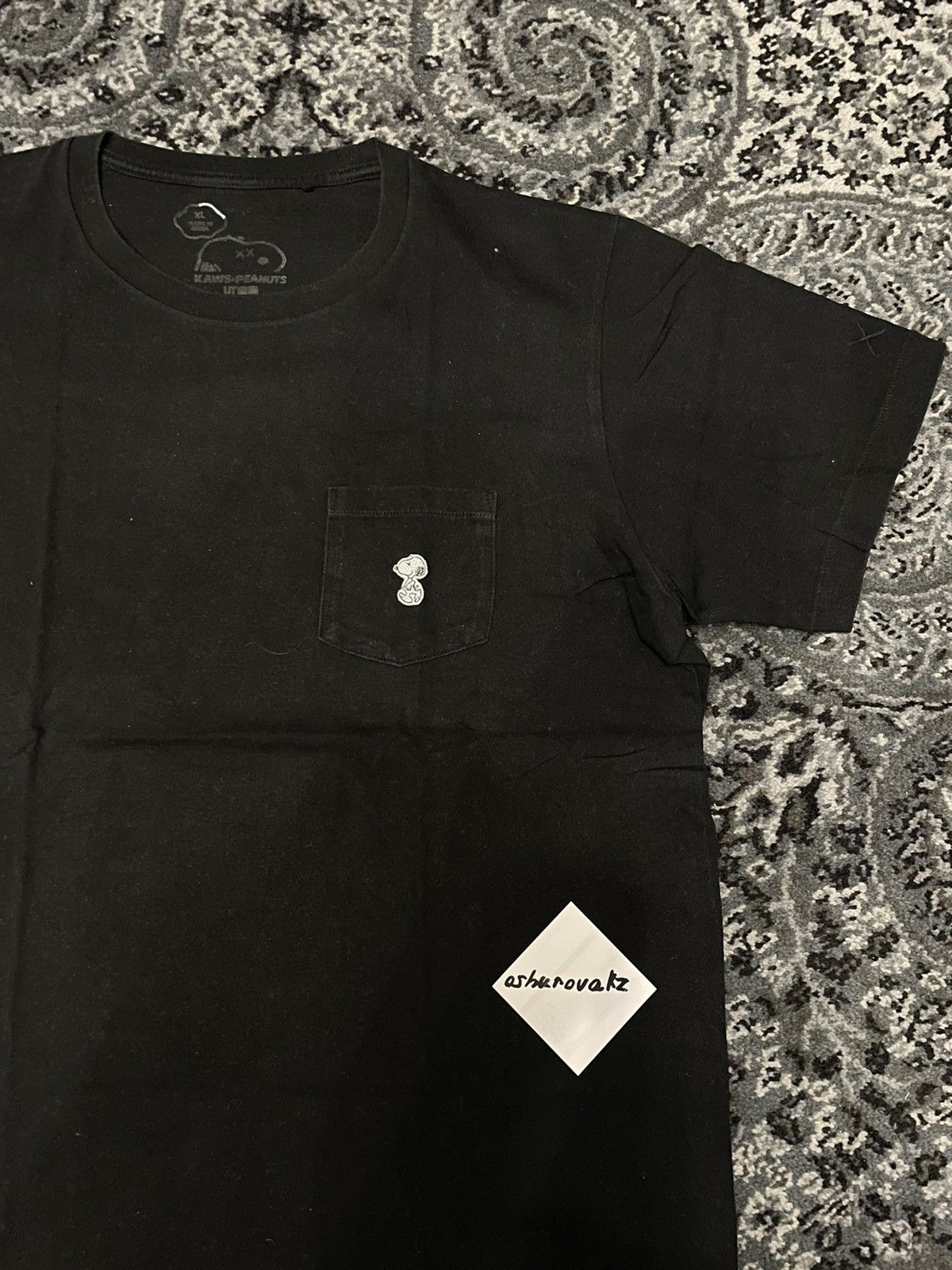 Kaws × Peanuts × Uniqlo Kaws x Uniqlo x Peanuts Tee Black Pocet Size US XL / EU 56 / 4 - 5 Thumbnail