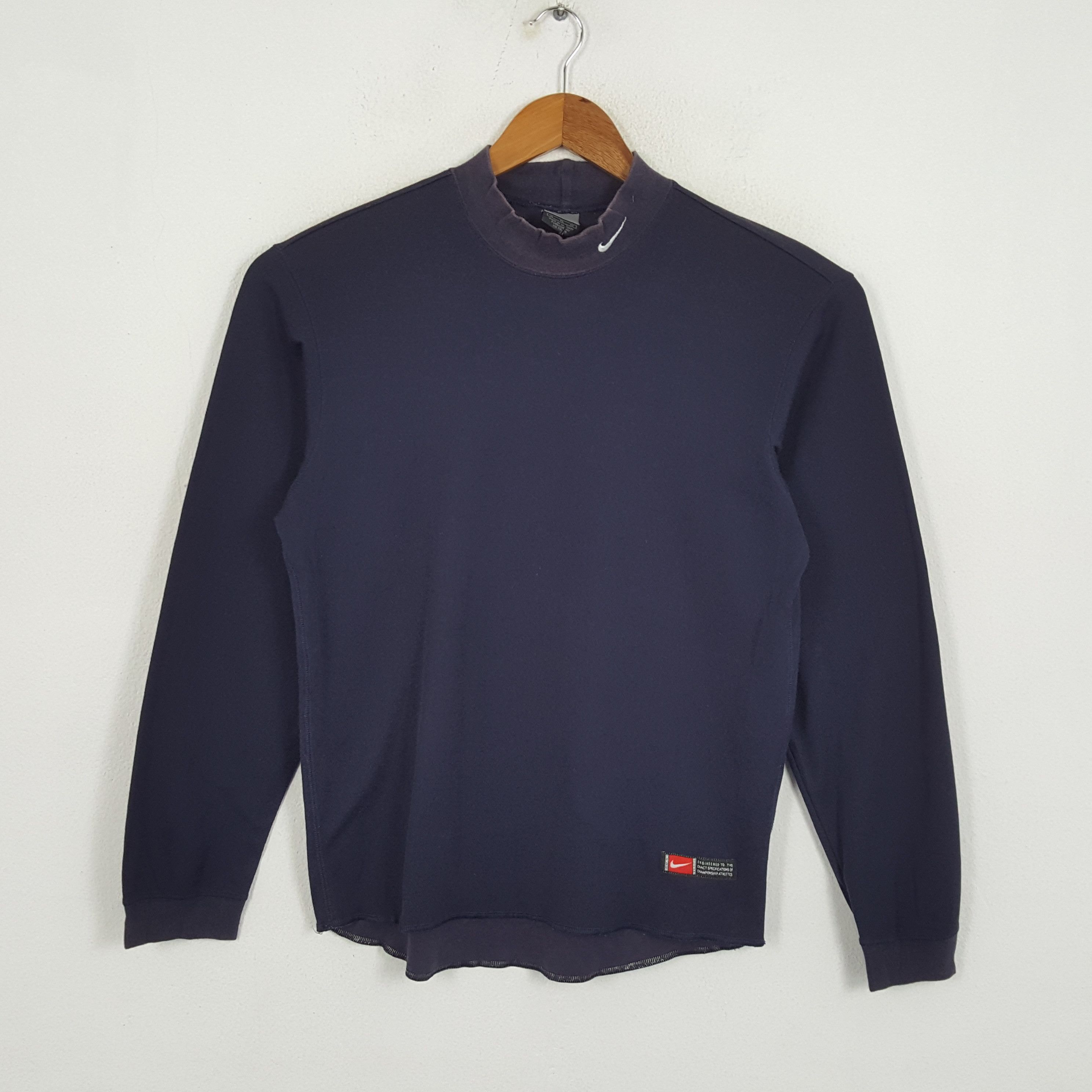 Vintage NIKE Small Swoosh Sportswear T-Shirts