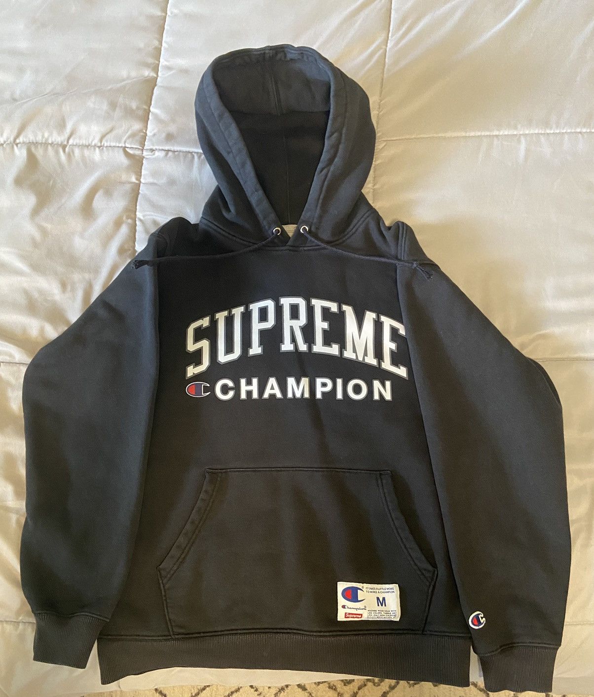 Store Black supreme x champion hoodie