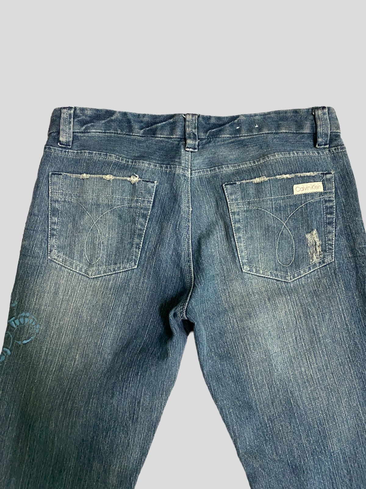 Calvin Klein FLARE CALVIN KLEINS LOW RISE EMBROIDERY FLORAL BOOT CUT Size 29" - 11 Thumbnail