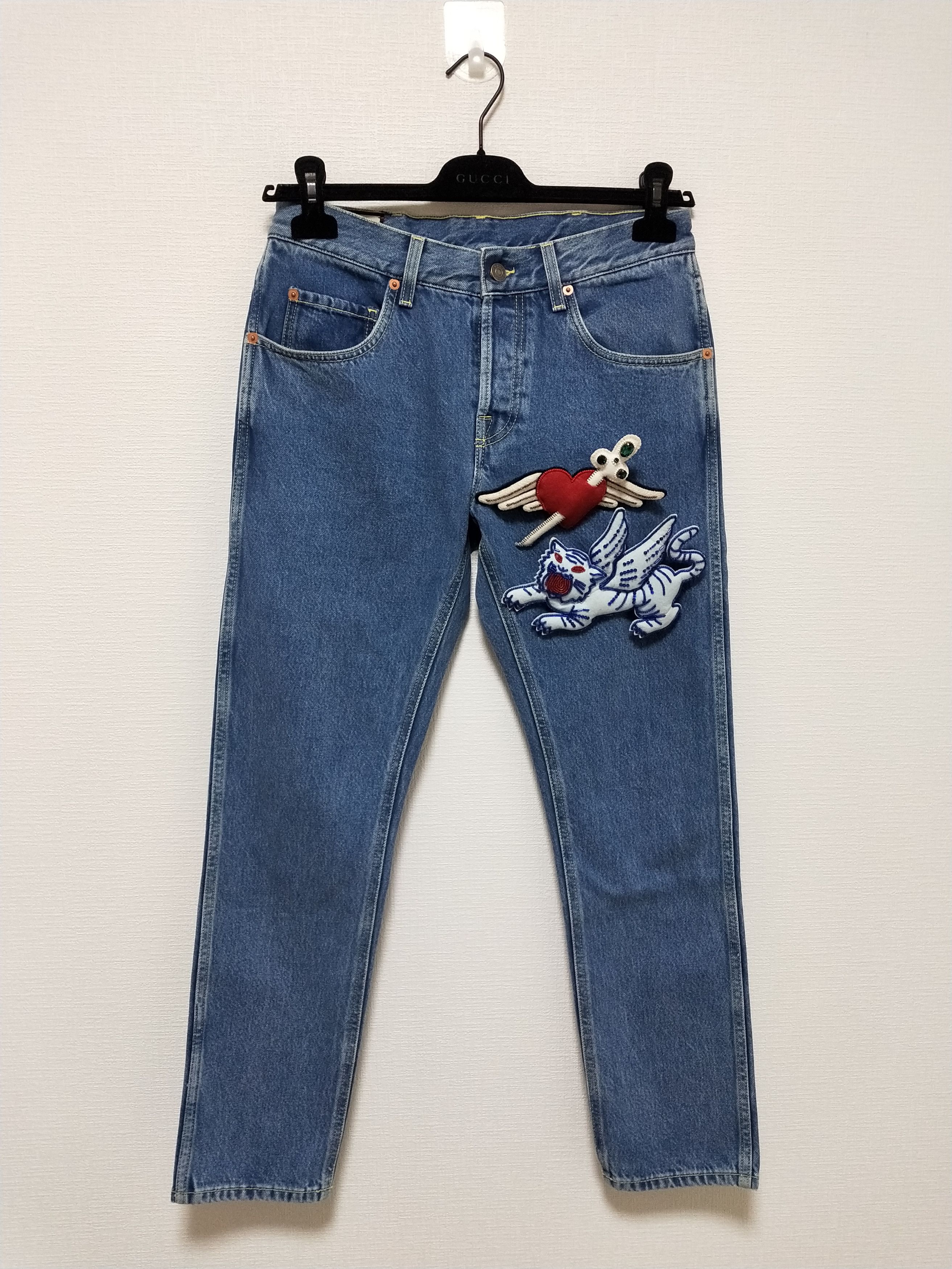 image of Gucci Tapered Jeans With Brooches in Blue, Men's (Size 30)