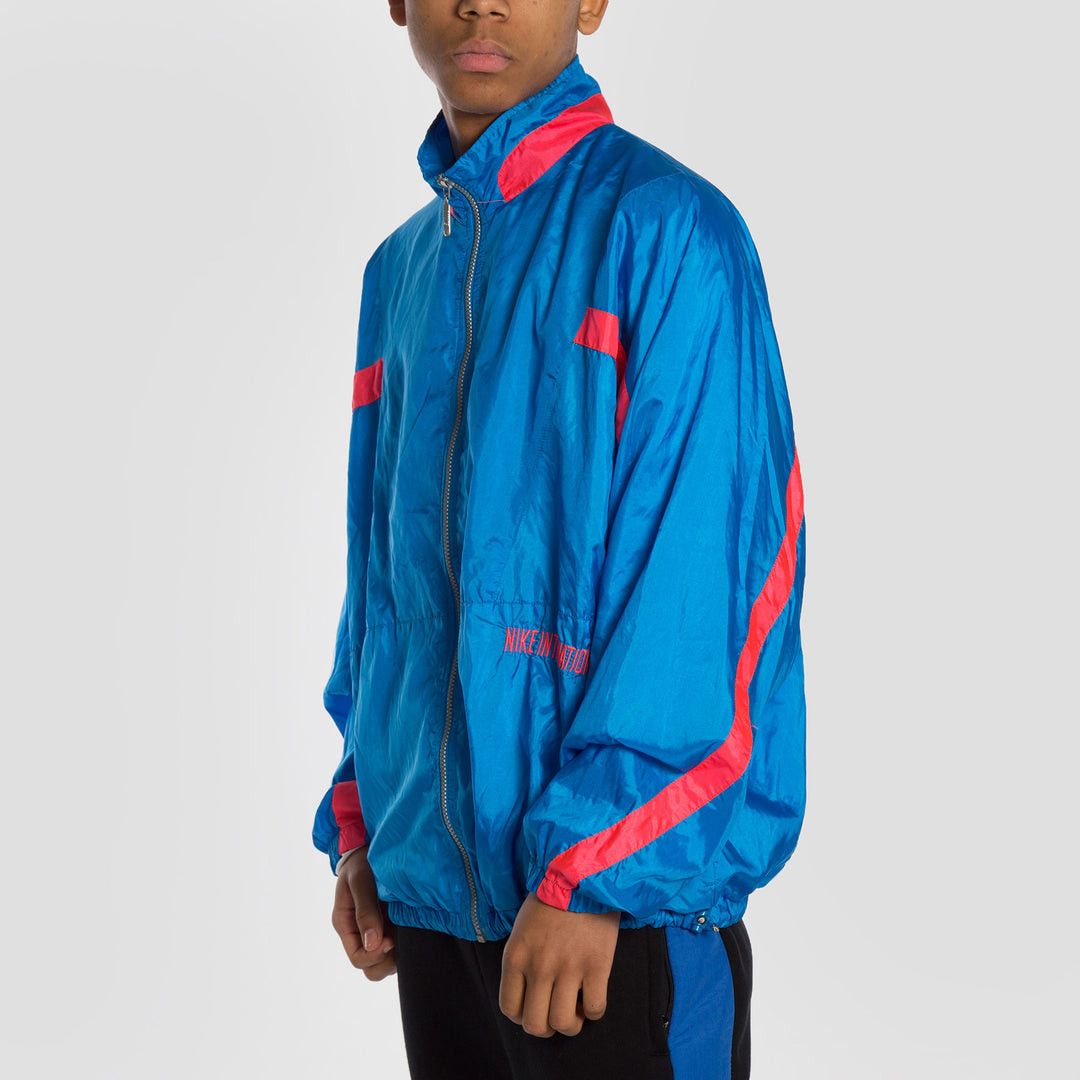 Nike × Vintage 90s Nike International Vintage nylon track jacket Size US L / EU 52-54 / 3 - 5 Thumbnail