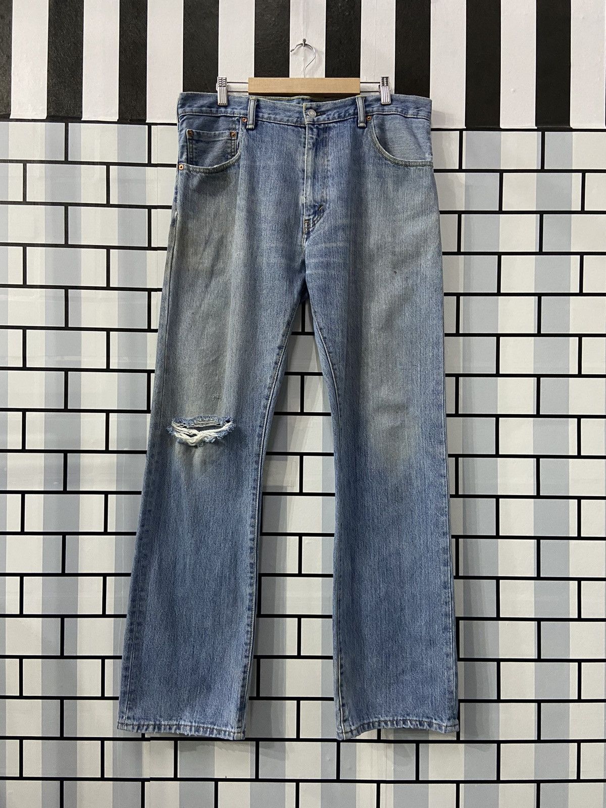 image of Levis x Vintage Levi’S 517 Light Wash Bootcut Distressed Denim Pants in Light Blue Wash (Size 36)