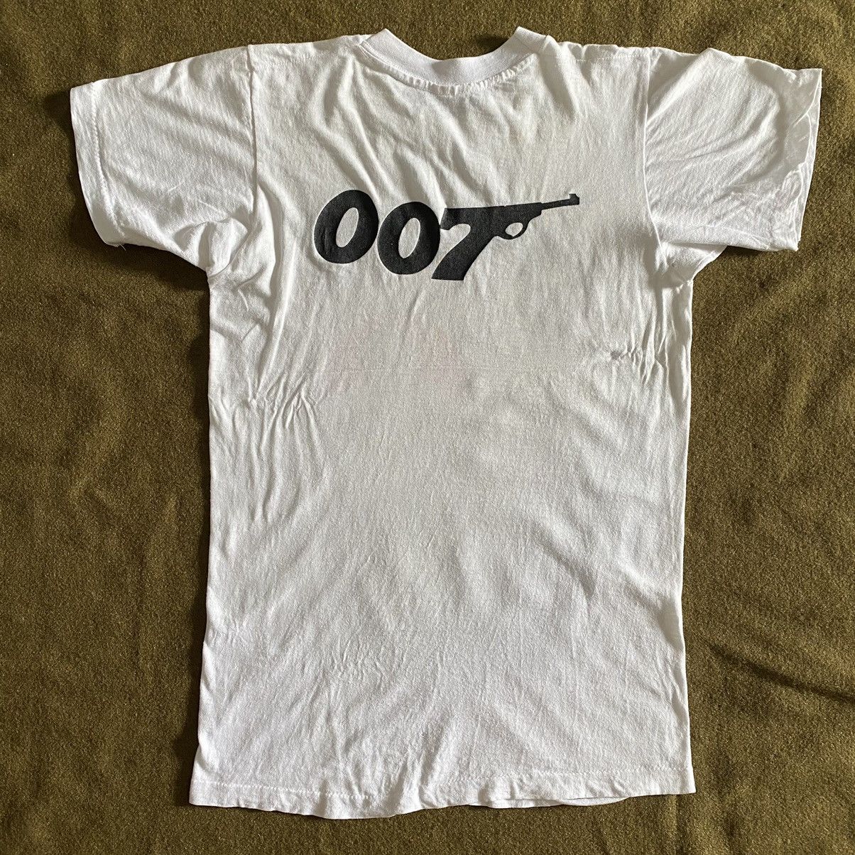 Vintage VINTAGE 80S JAMES BOND MOVIE T-SHIRT Size US S / EU 44-46 / 1 - 2 Thumbnail