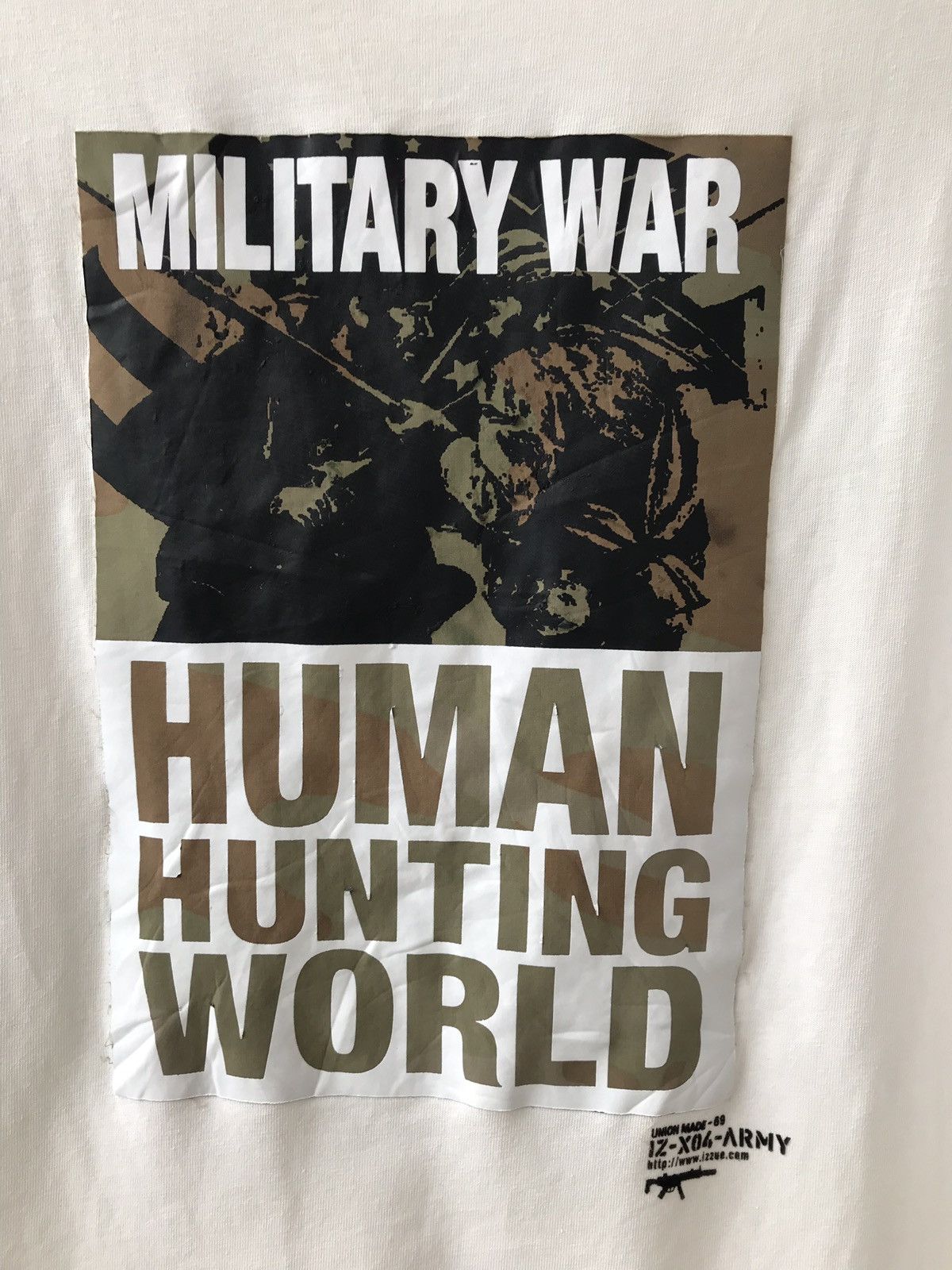 Japanese Brand × izzue Izzue Tee IZ-X04-ARMY Military Army Human Hunting World Size US S / EU 44-46 / 1 - 3 Thumbnail
