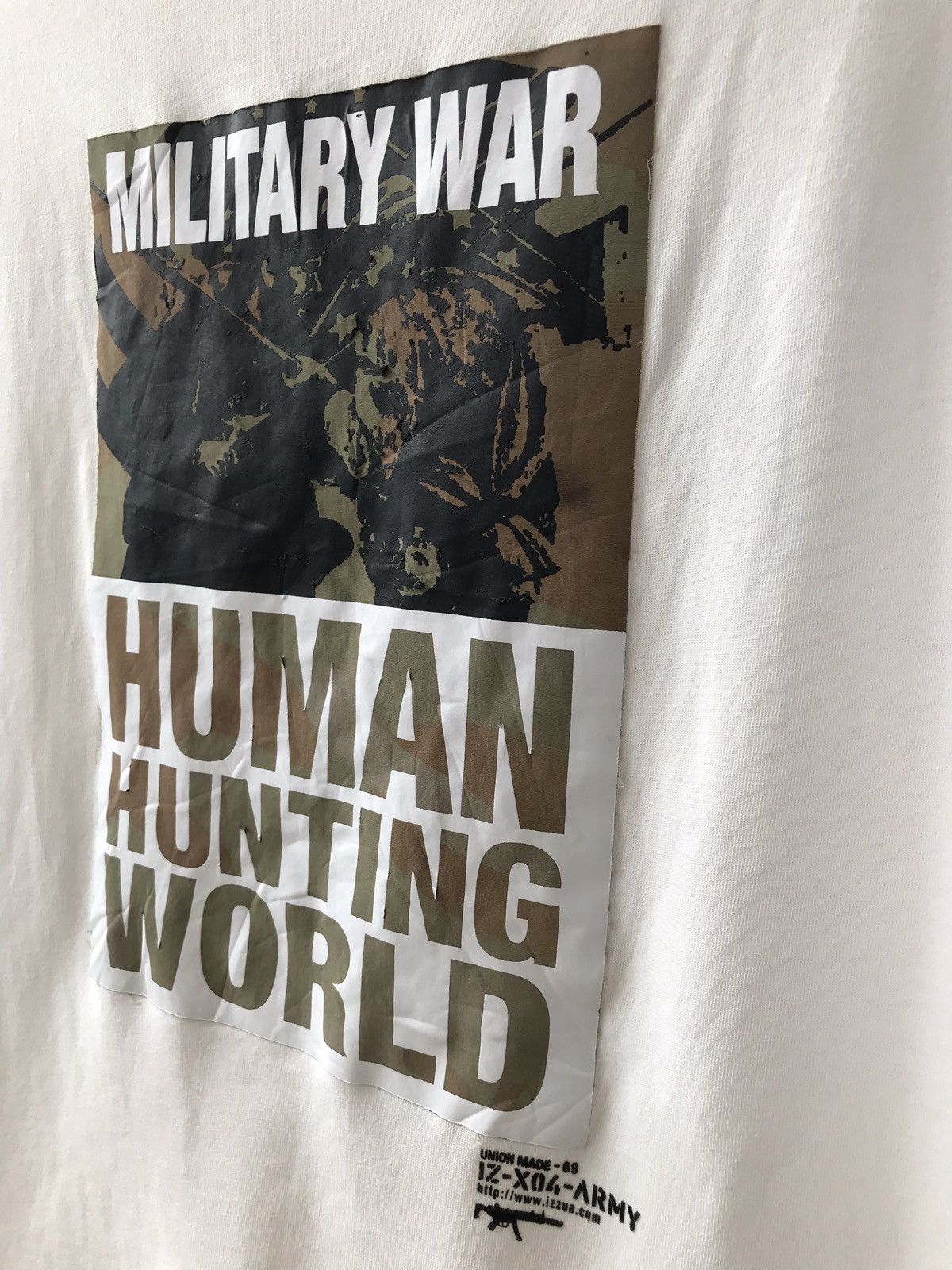Japanese Brand × izzue Izzue Tee IZ-X04-ARMY Military Army Human Hunting World Size US S / EU 44-46 / 1 - 6 Thumbnail