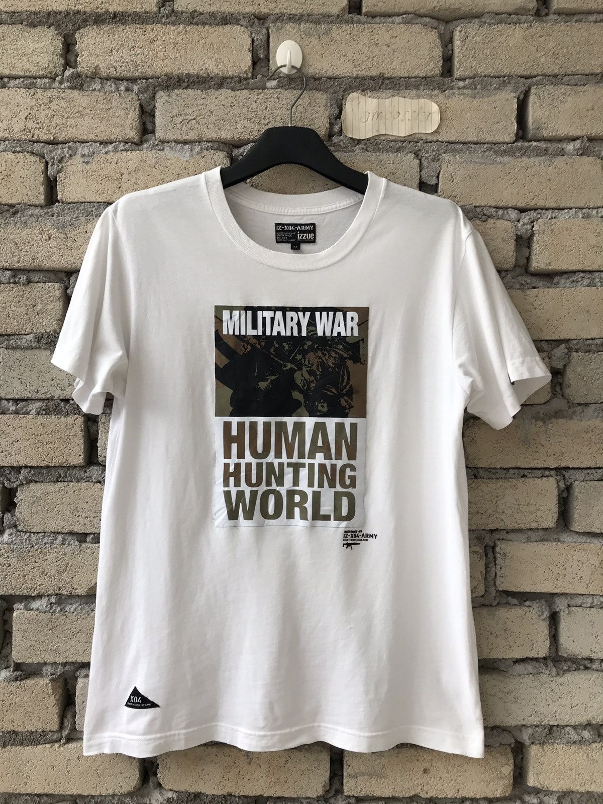 Japanese Brand × izzue Izzue Tee IZ-X04-ARMY Military Army Human Hunting World Size US S / EU 44-46 / 1 - 1 Thumbnail