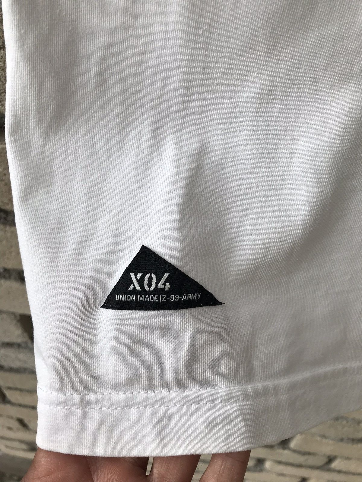 Japanese Brand × izzue Izzue Tee IZ-X04-ARMY Military Army Human Hunting World Size US S / EU 44-46 / 1 - 7 Thumbnail