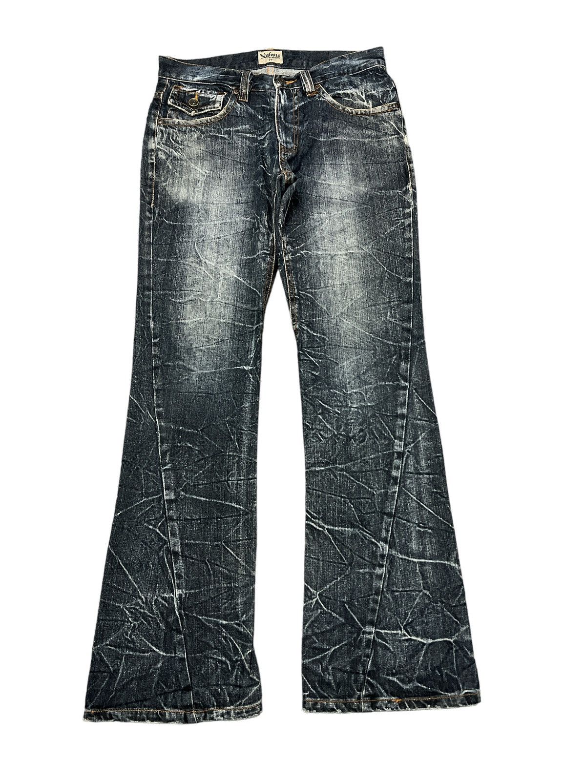 FLARED💥NYLAUS DISTRESSED TWIST DENIM PANT