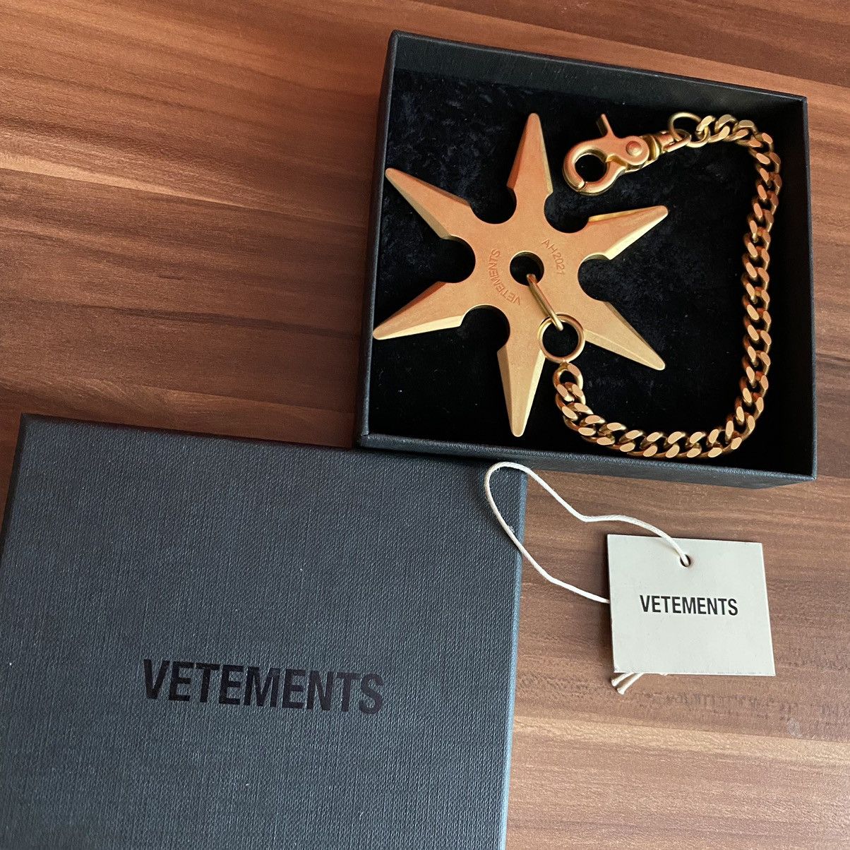 image of Vetements Throwing Star Key Chain in Brass, Men's