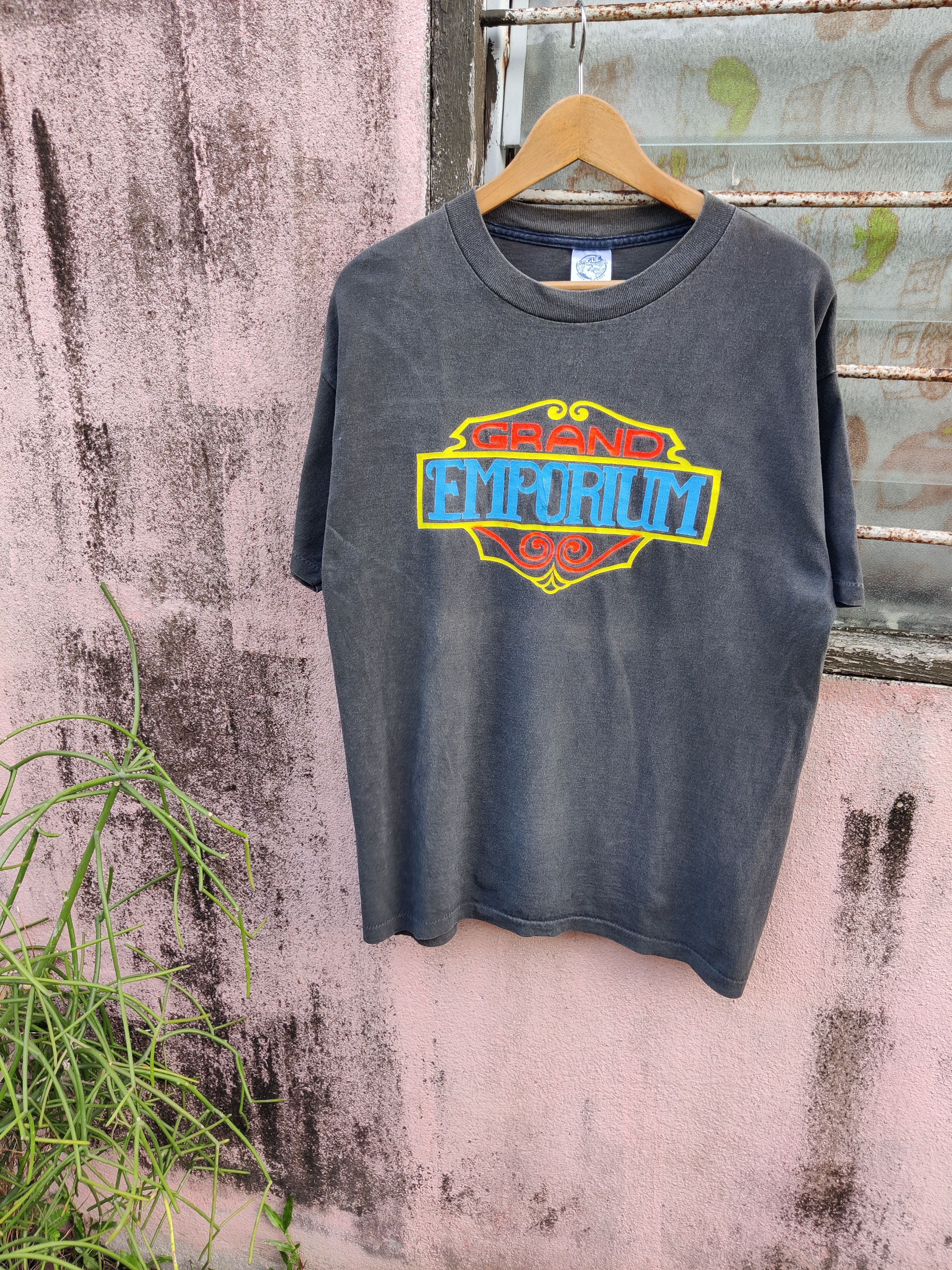 image of Band Tees x Rock T Shirt Vintage Faded Grand Emporium Blue Alive Award Band Shirt (Size Large)