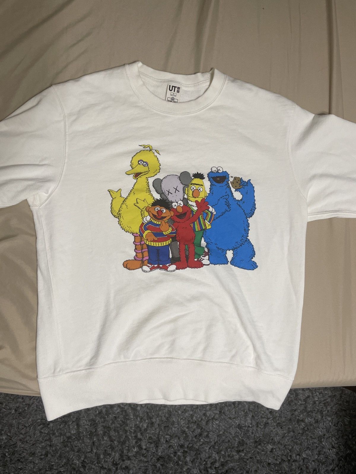 Kaws sweatshirt sesame street hot sale