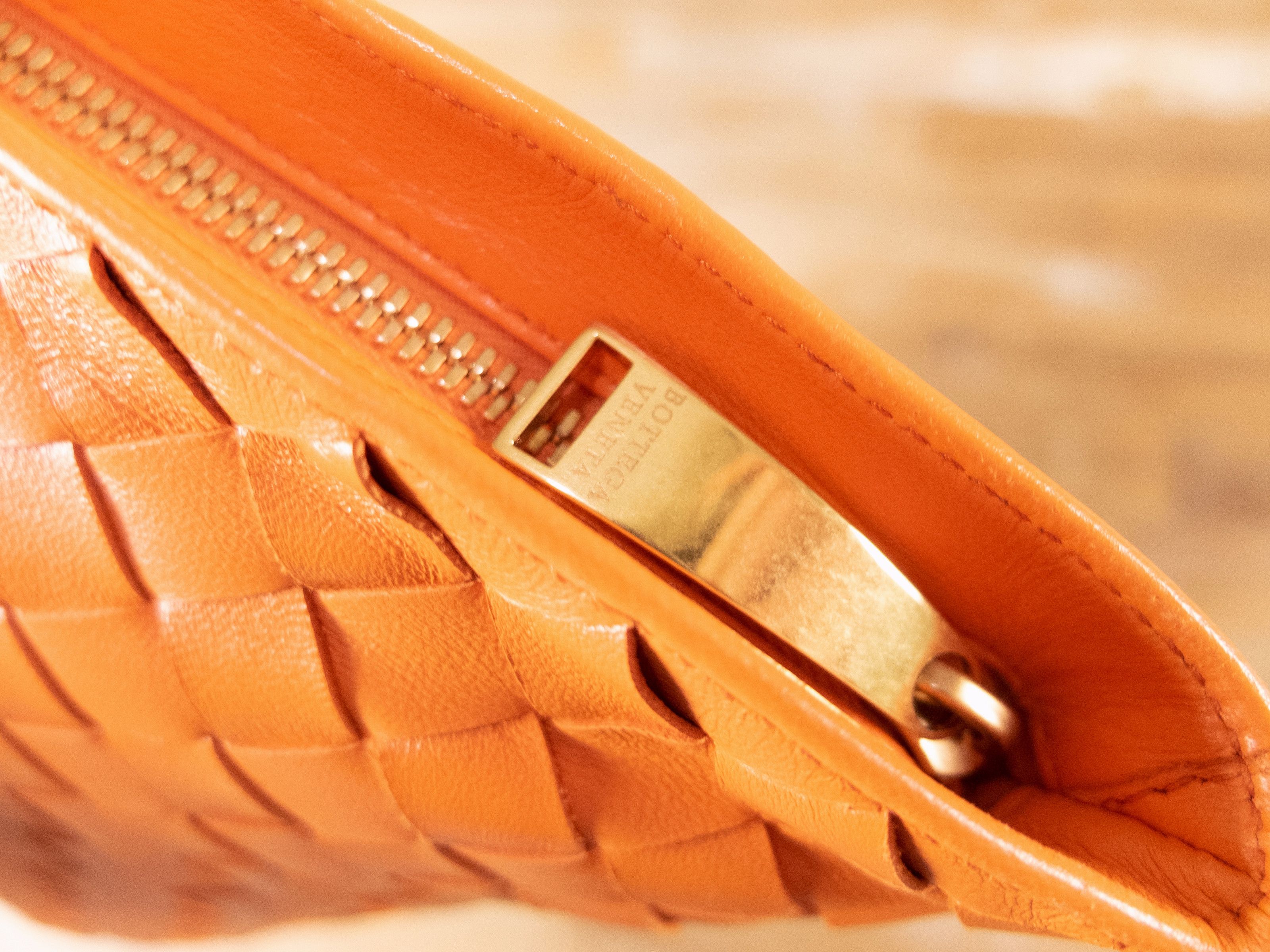 BOTTEGA VENETA Twist orange intrecciato woven leather bag