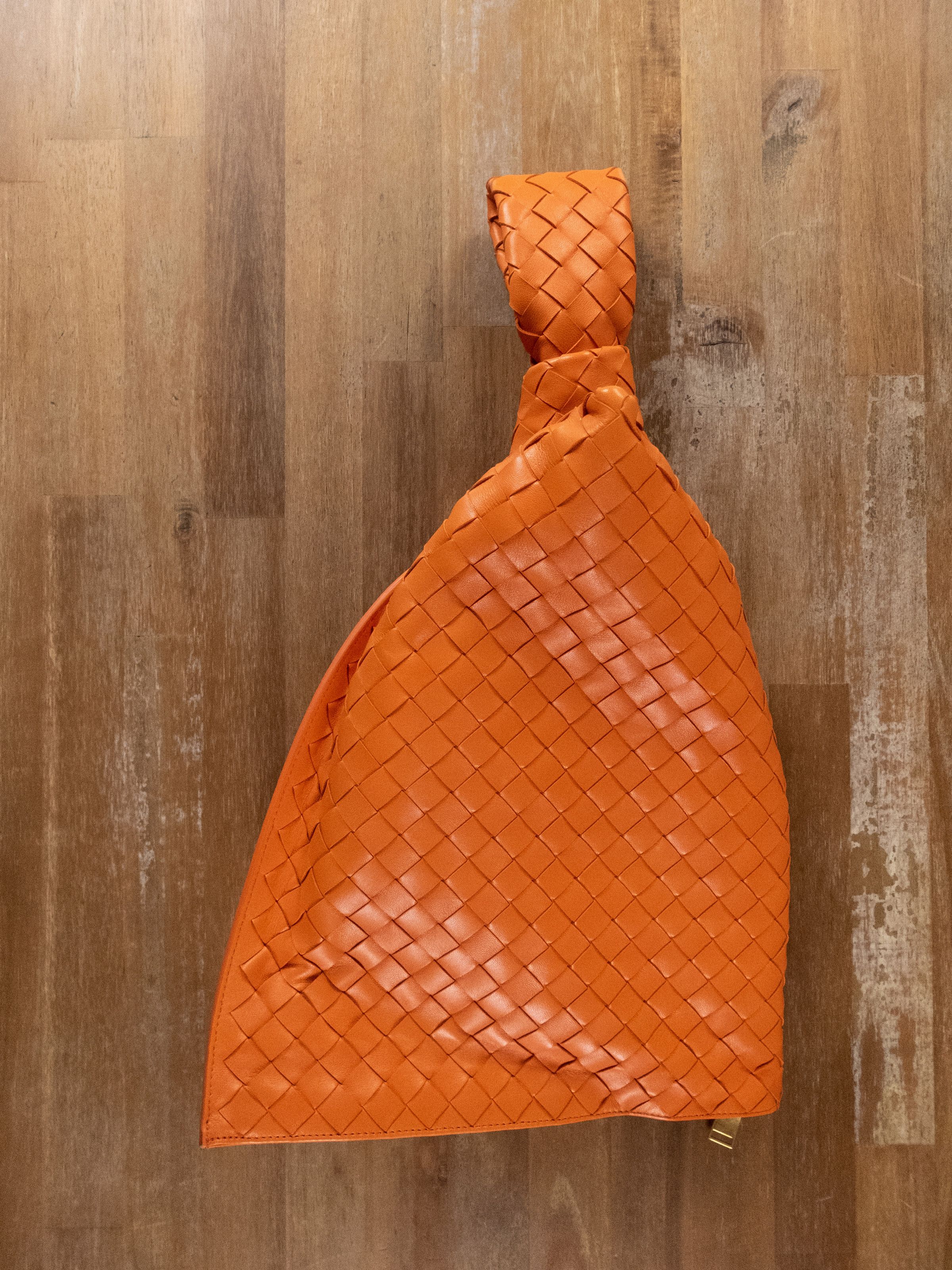 BOTTEGA VENETA Twist orange intrecciato woven leather bag