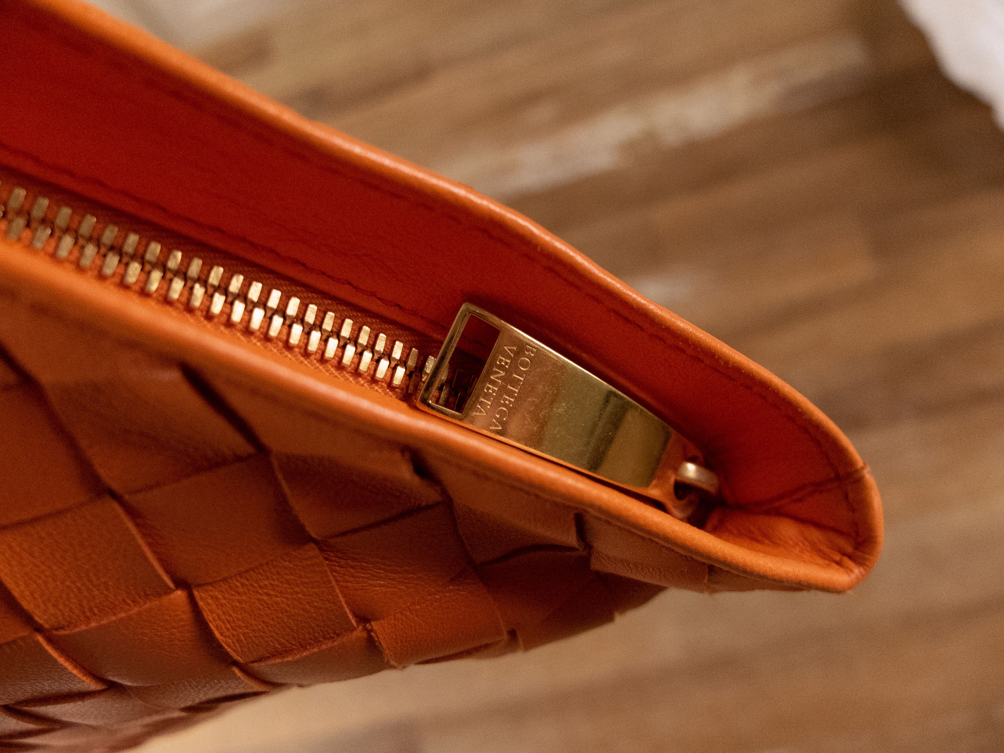 BOTTEGA VENETA Twist orange intrecciato woven leather bag