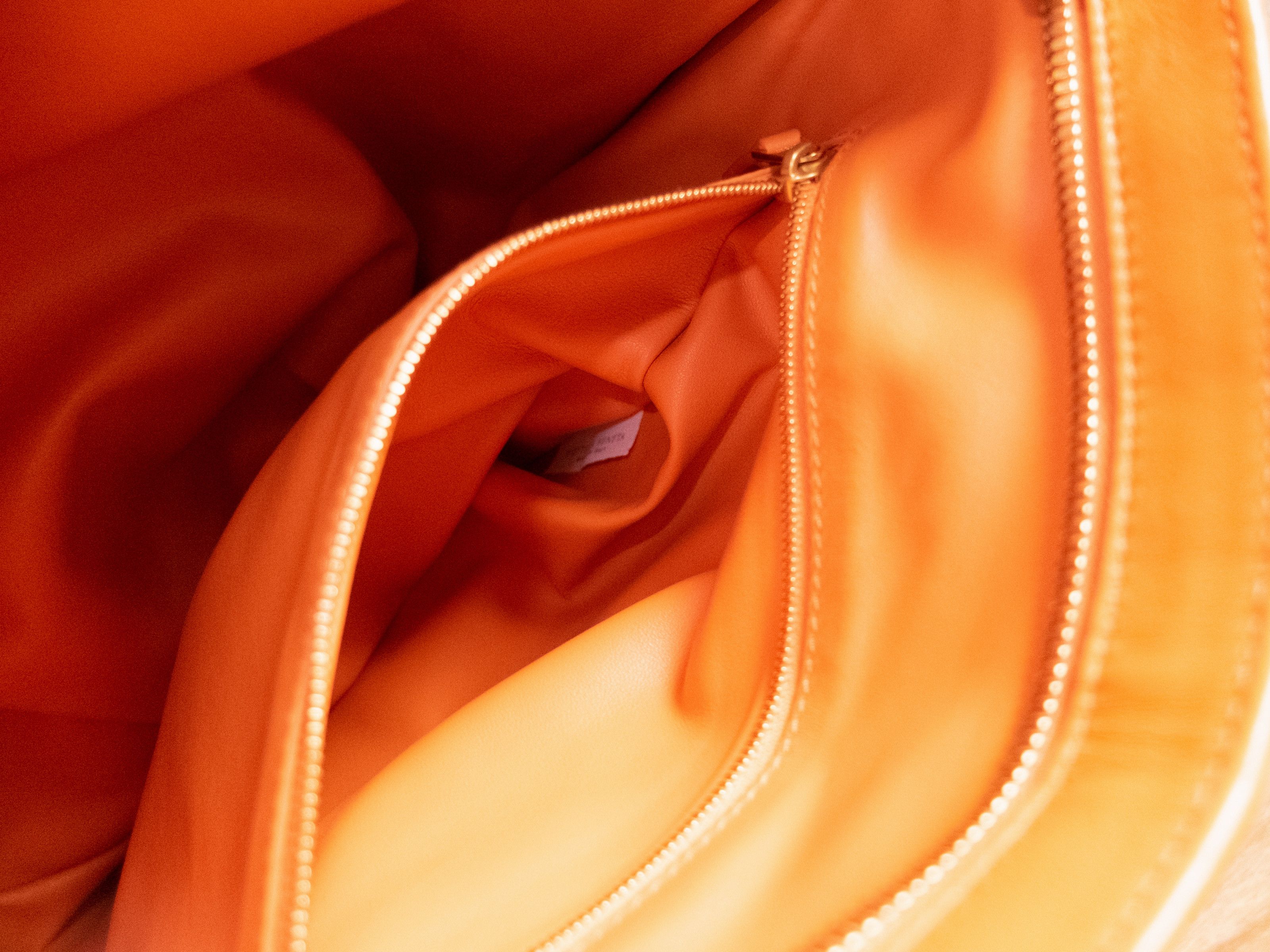 BOTTEGA VENETA Twist orange intrecciato woven leather bag