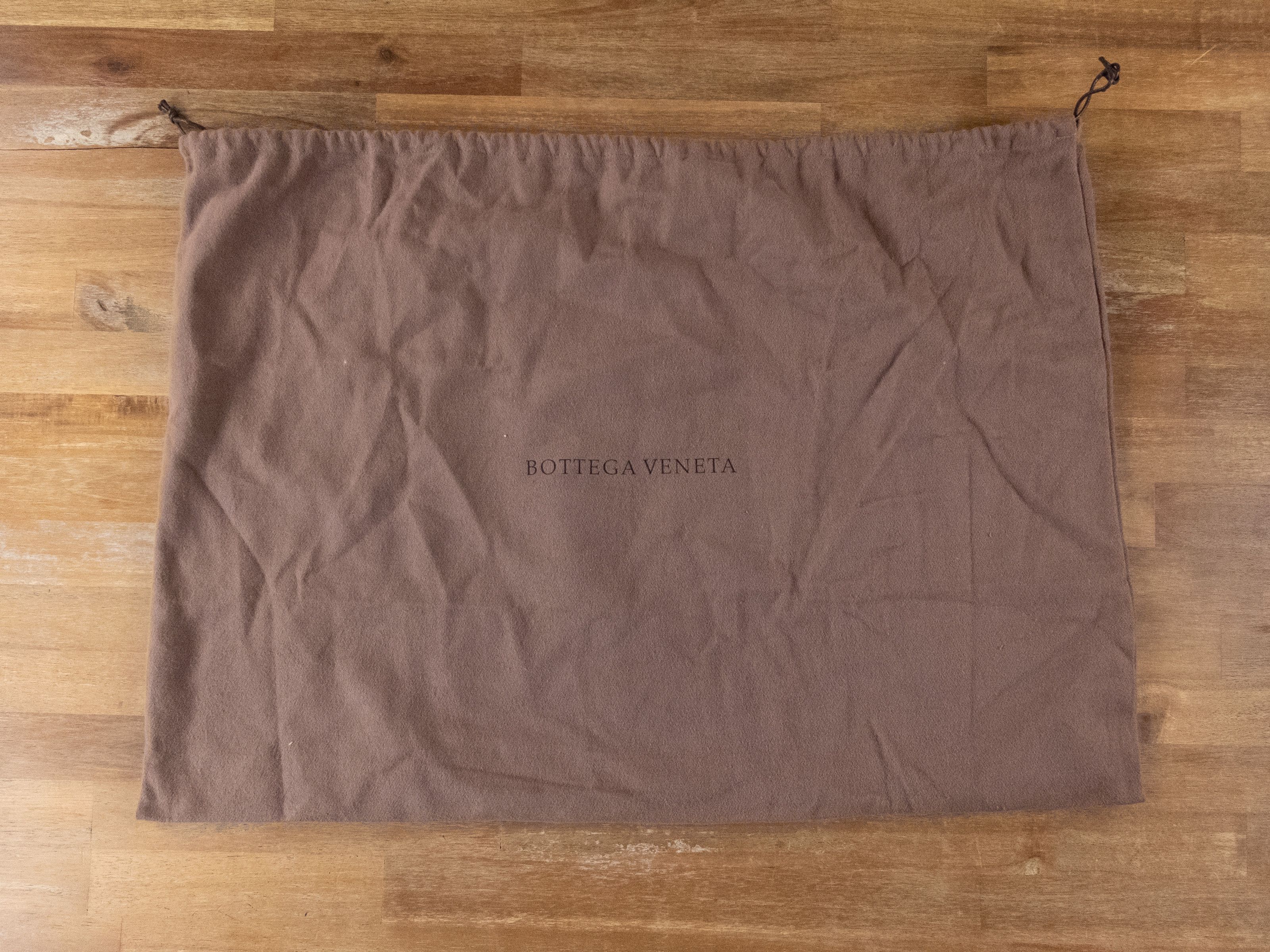 BOTTEGA VENETA Twist orange intrecciato woven leather bag