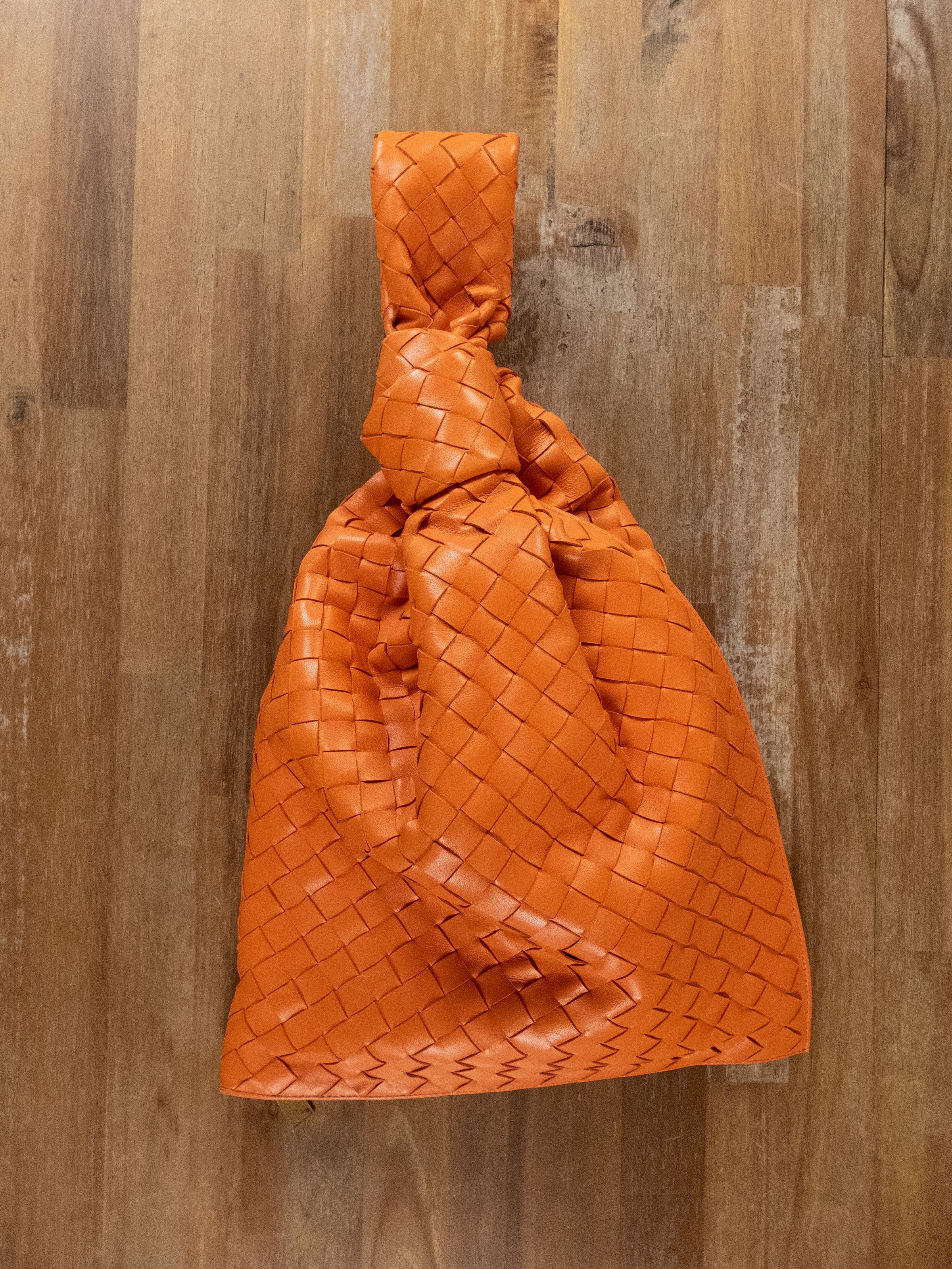 BOTTEGA VENETA Twist orange intrecciato woven leather bag