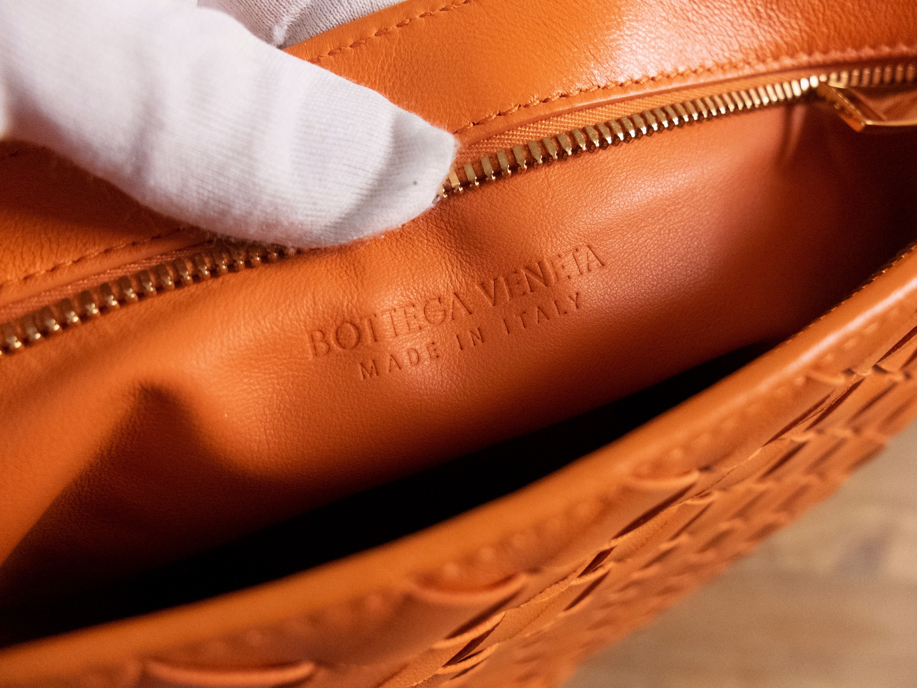 BOTTEGA VENETA Twist orange intrecciato woven leather bag