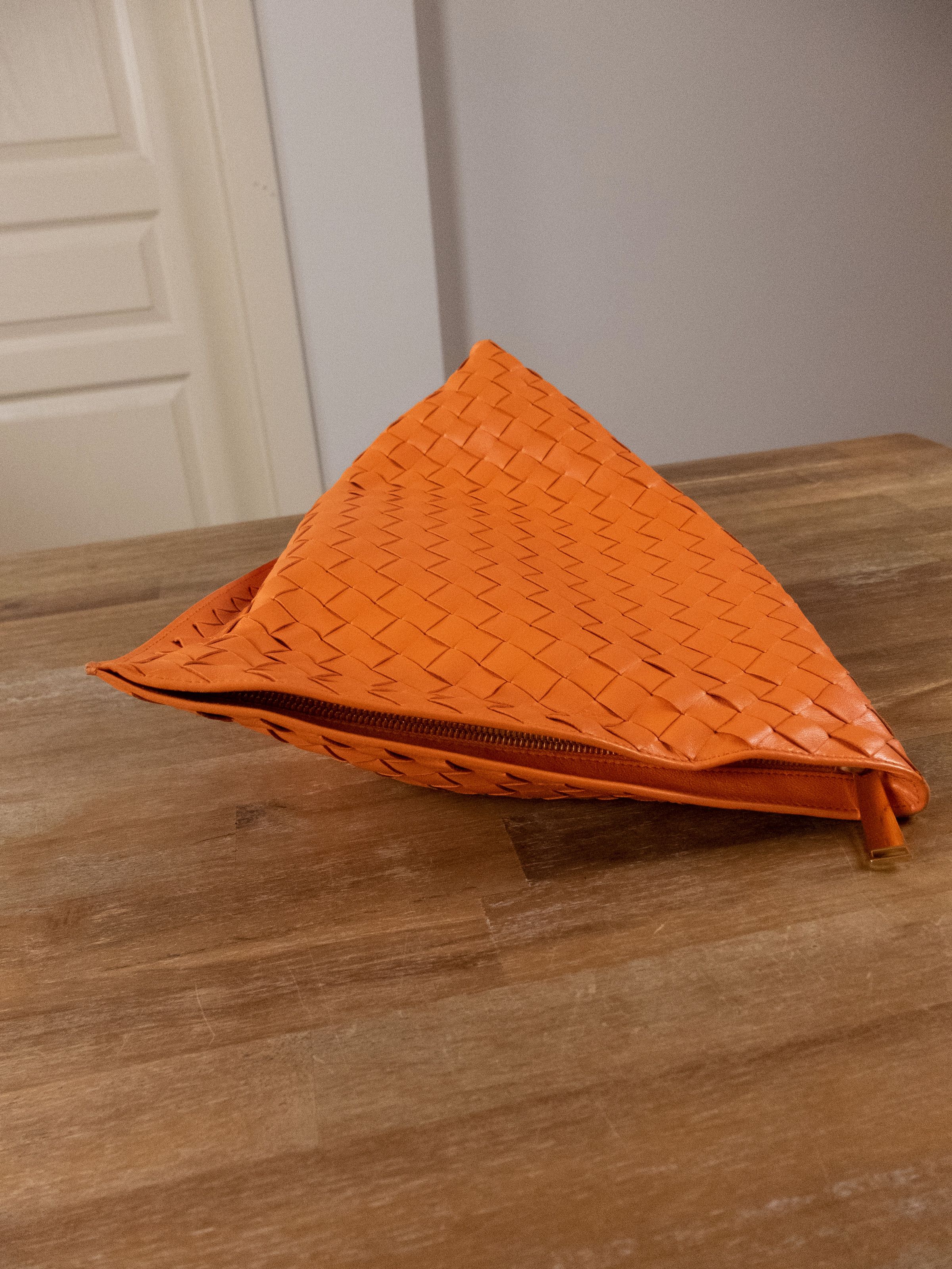 BOTTEGA VENETA Twist orange intrecciato woven leather bag