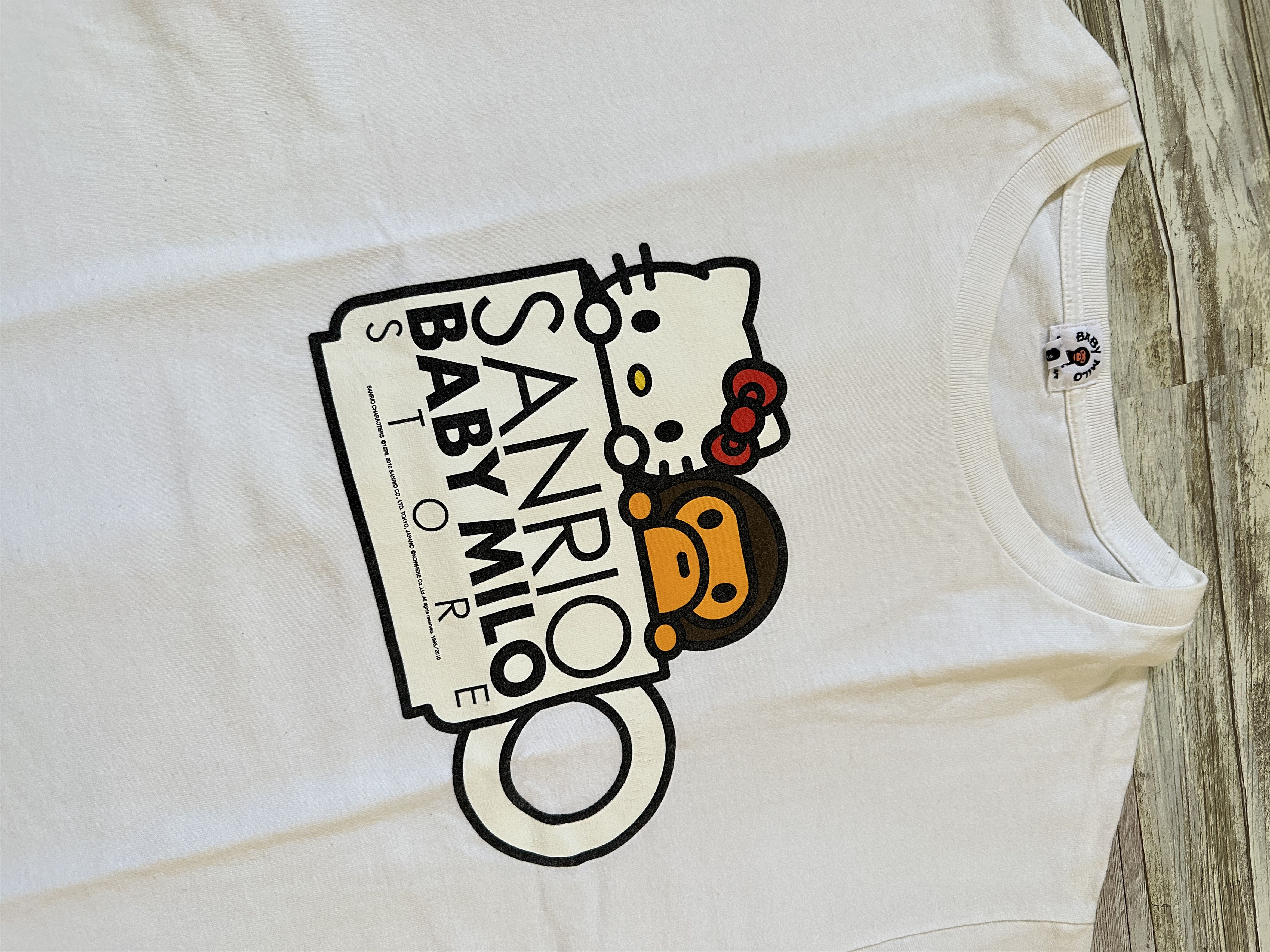 image of Bape Sanrio Baby Milo Hello Kitty Cup Tee in White, Men's (Size XL)